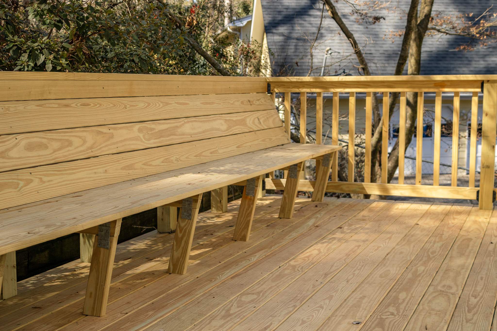 Deck Resurface with Wood Bench Install Using Pressure Treated Pine by Nelson Exteriors