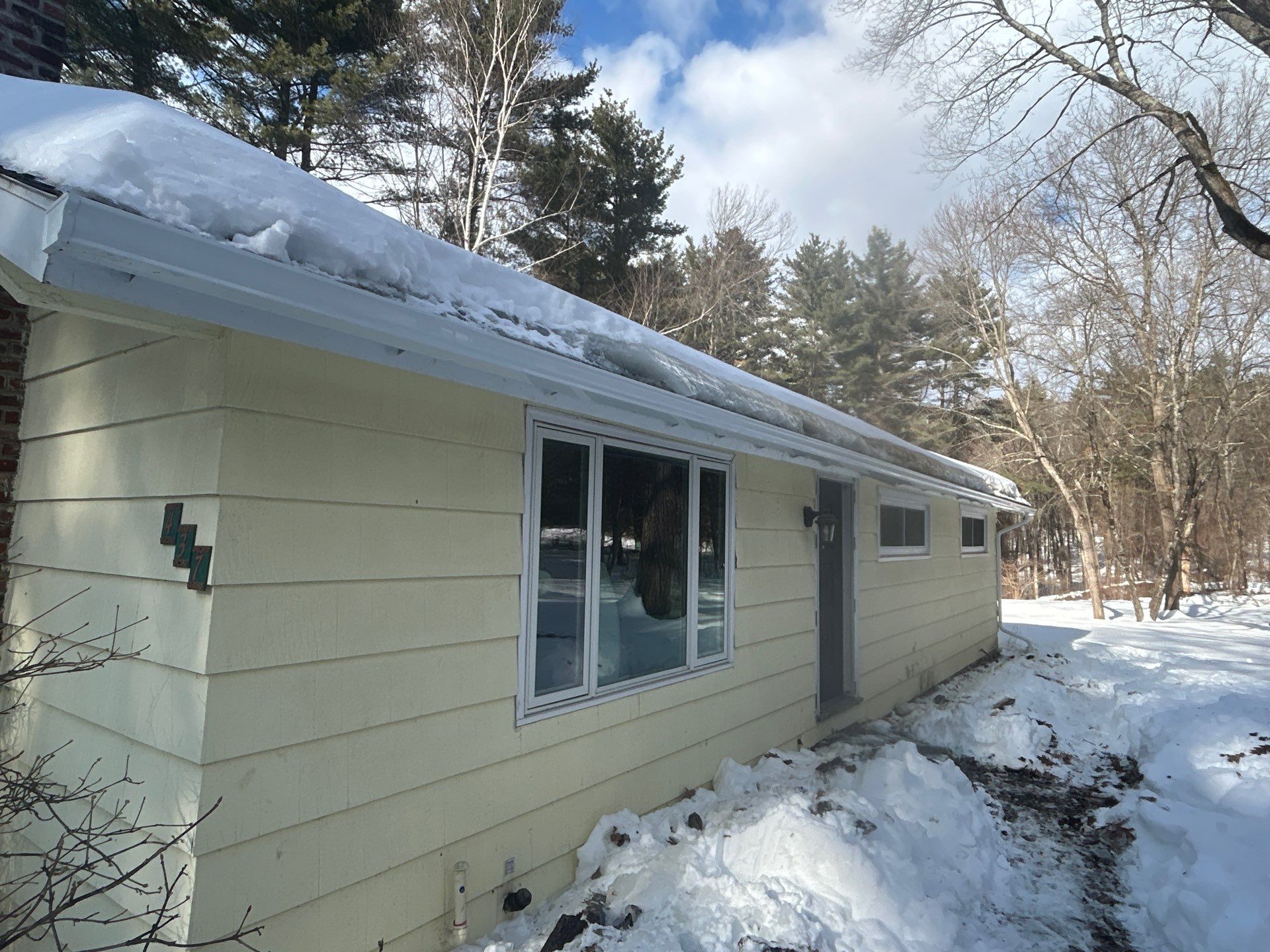 Gutter Installation Project in Stow by Mighty Dog Roofing of Greater Middlesex County
