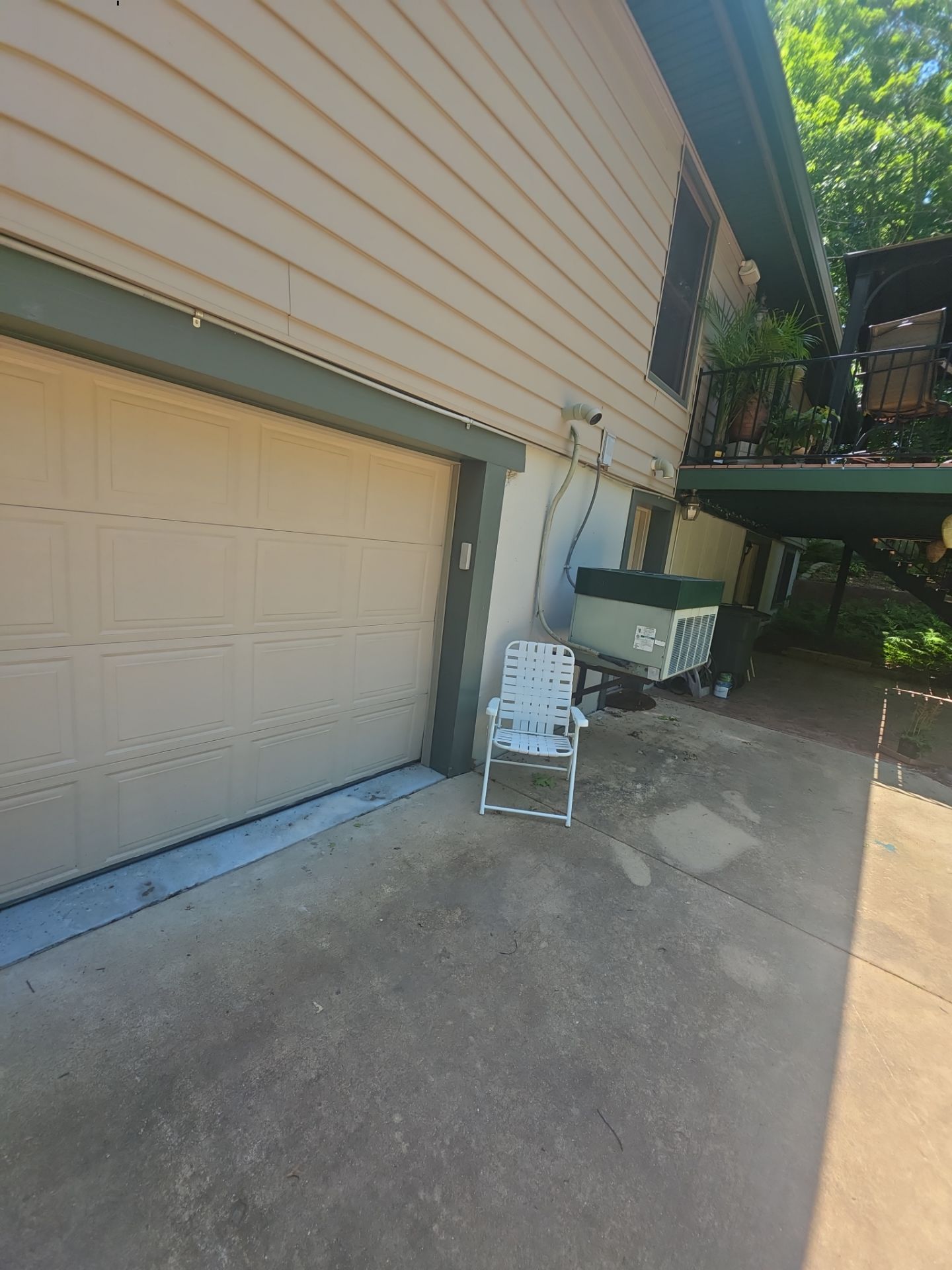 Exterior Entry Door and Garage Door Painting by Legendary Services Company LLC.