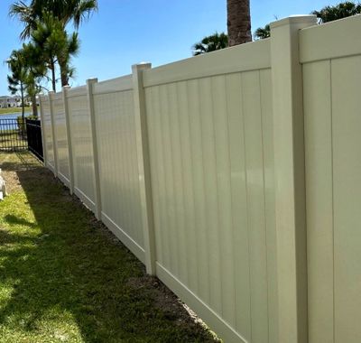 Vinyl Fence Installation using Vinyl Fence and Black 3 Rail Aluminum Fence
