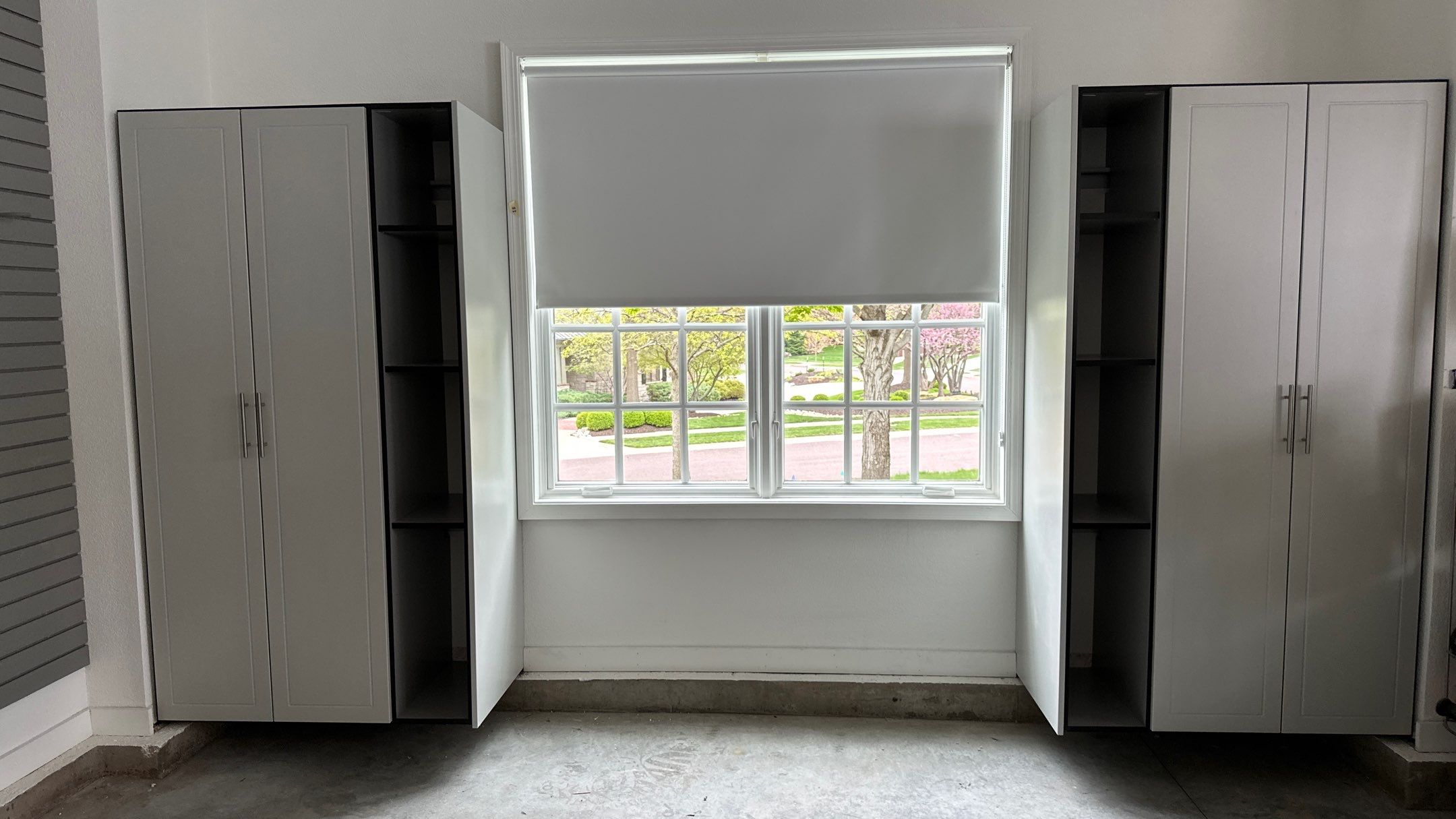 Brooke L. added cabinets for a clean storage look by Banner Garage