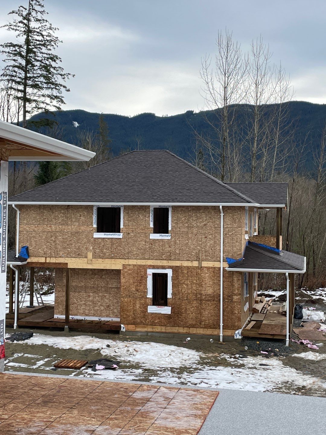 Residential Roofing Installation using OC Oakridge shingles by Top Notch Roofing Inc