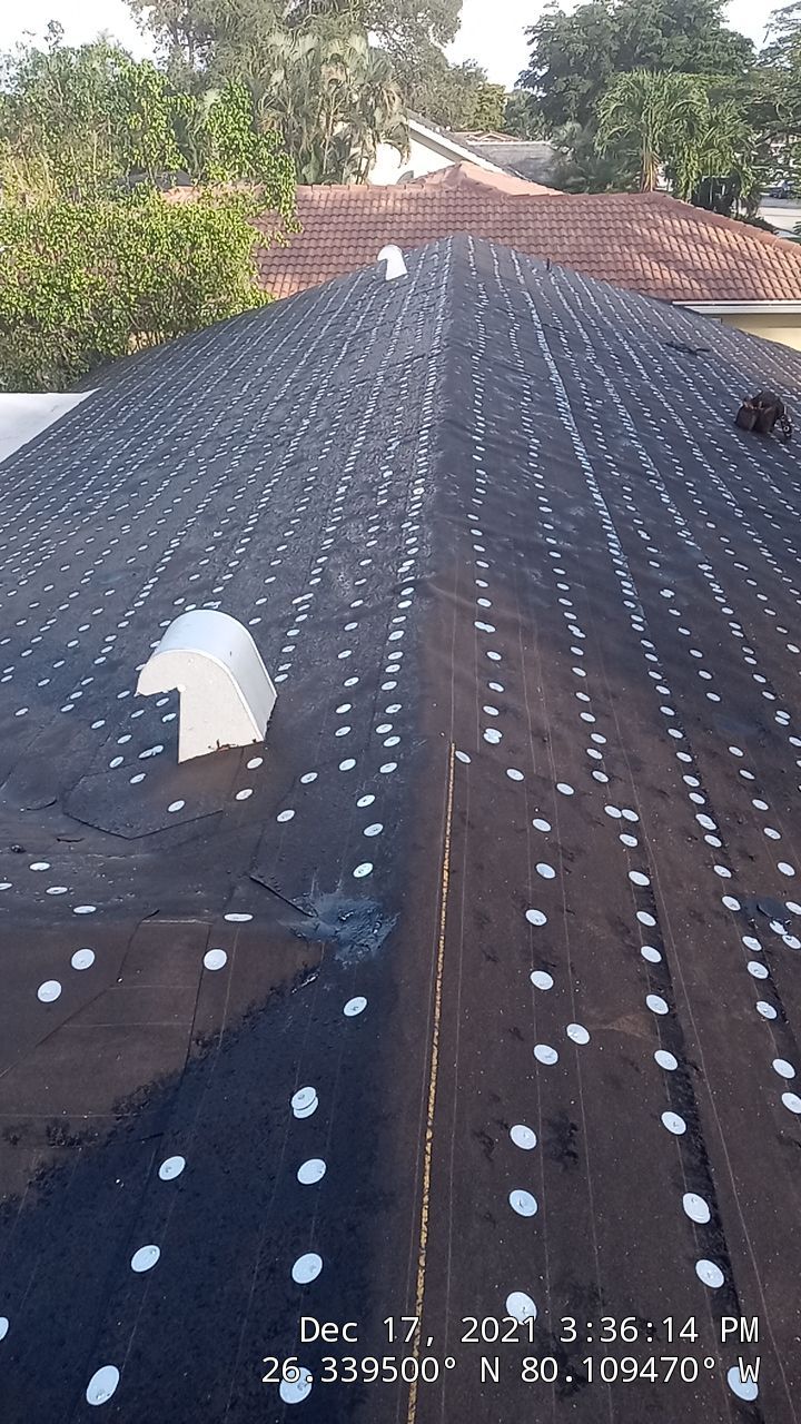 Residential Roofing Installation using 1" Nail strip metal roof by BLUES BROTHERS ROOFING