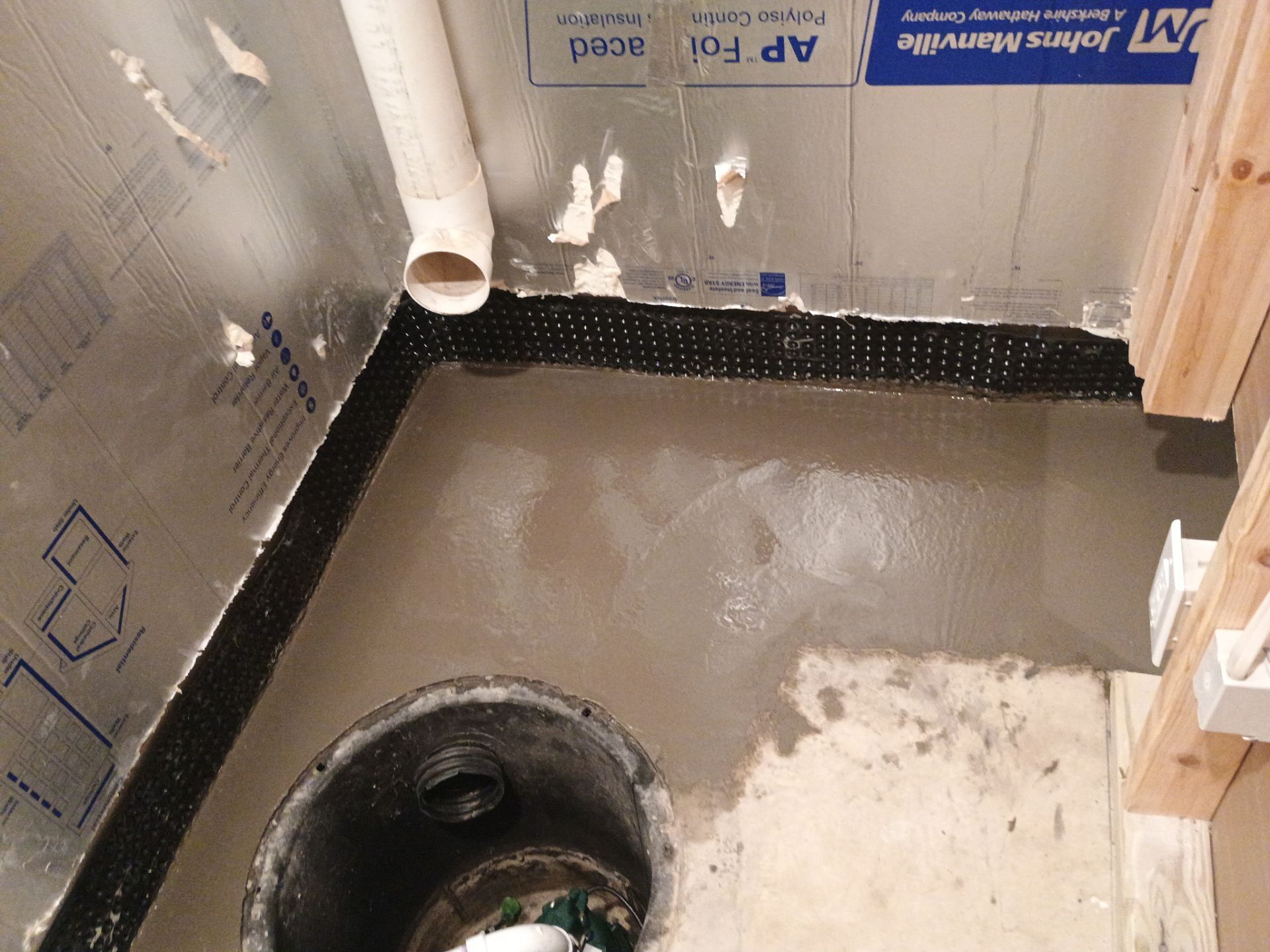 Interior Drain Tile & Buried Discharge in St. Anthony, MN by Waterproofing Northeast