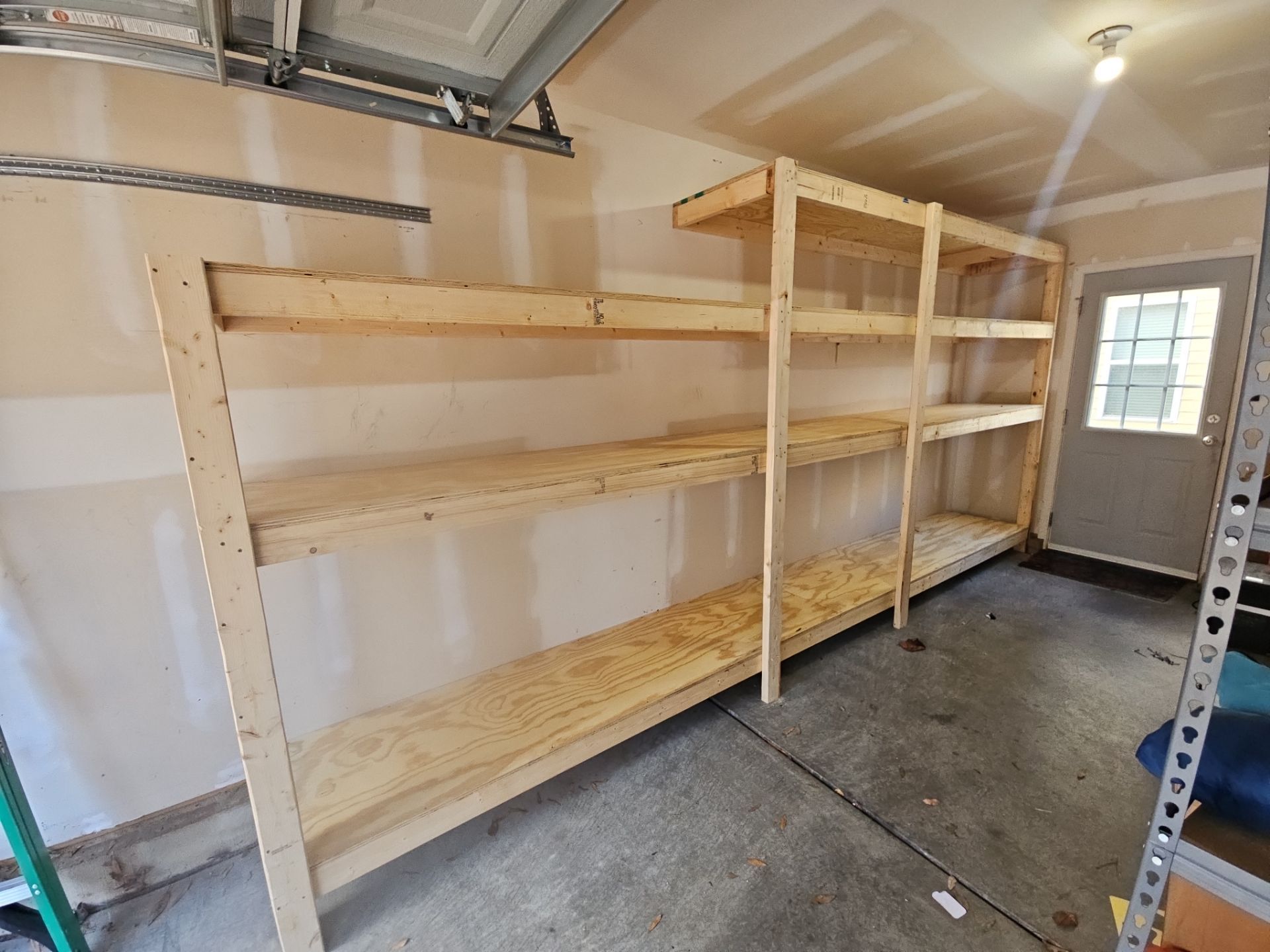 Custom "Climb-Tested" Garage Storage by A Step Above Handy LLC