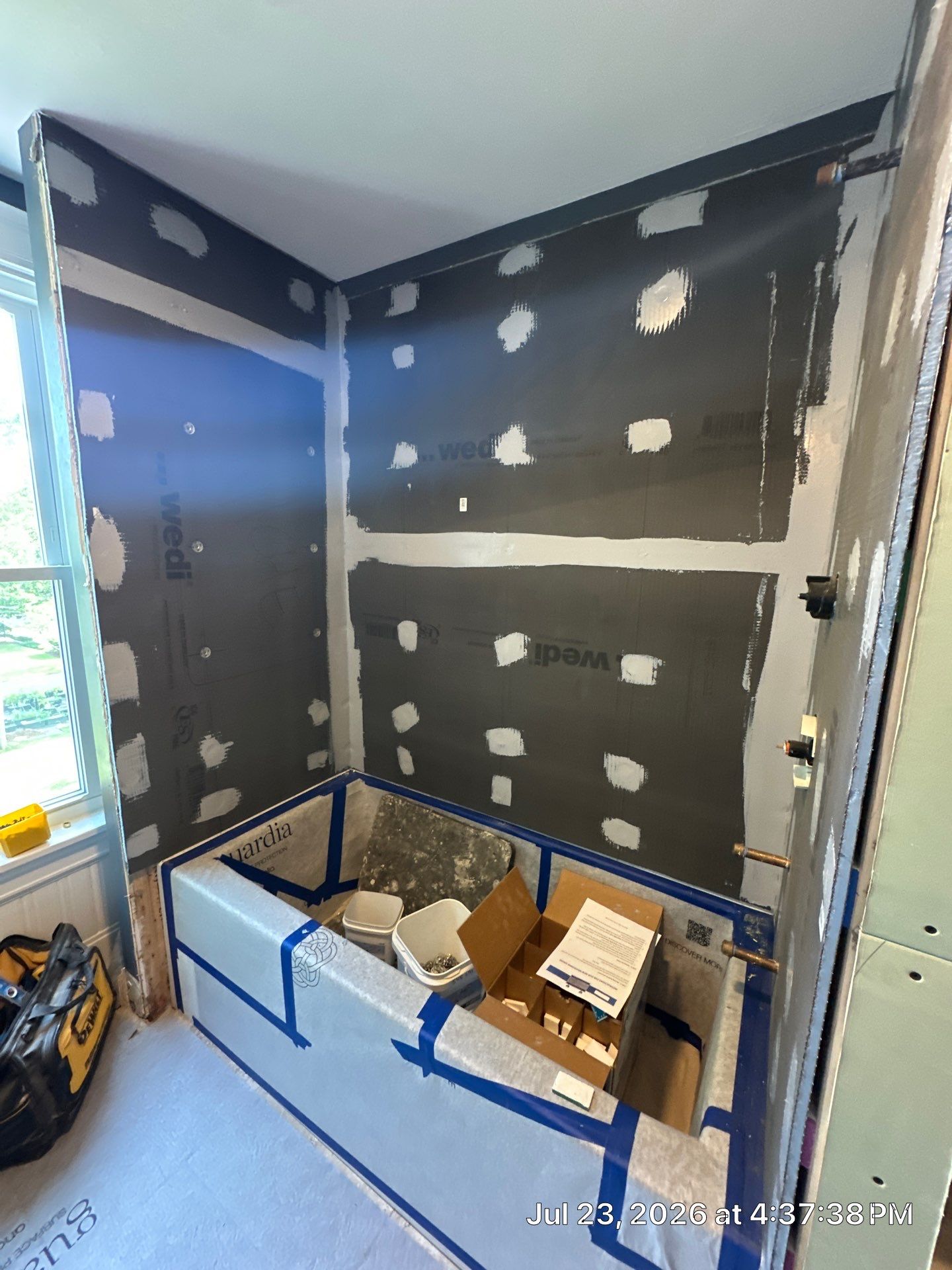 Manchester Bathroom Remodel with Subway Tile Surround and Granite Vanity by Renovatic LLC