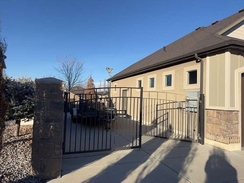 South Jordan | Massive Board & Batten Upgrade | Cobble Stone & Dark Bronze by Ideal Siding Utah