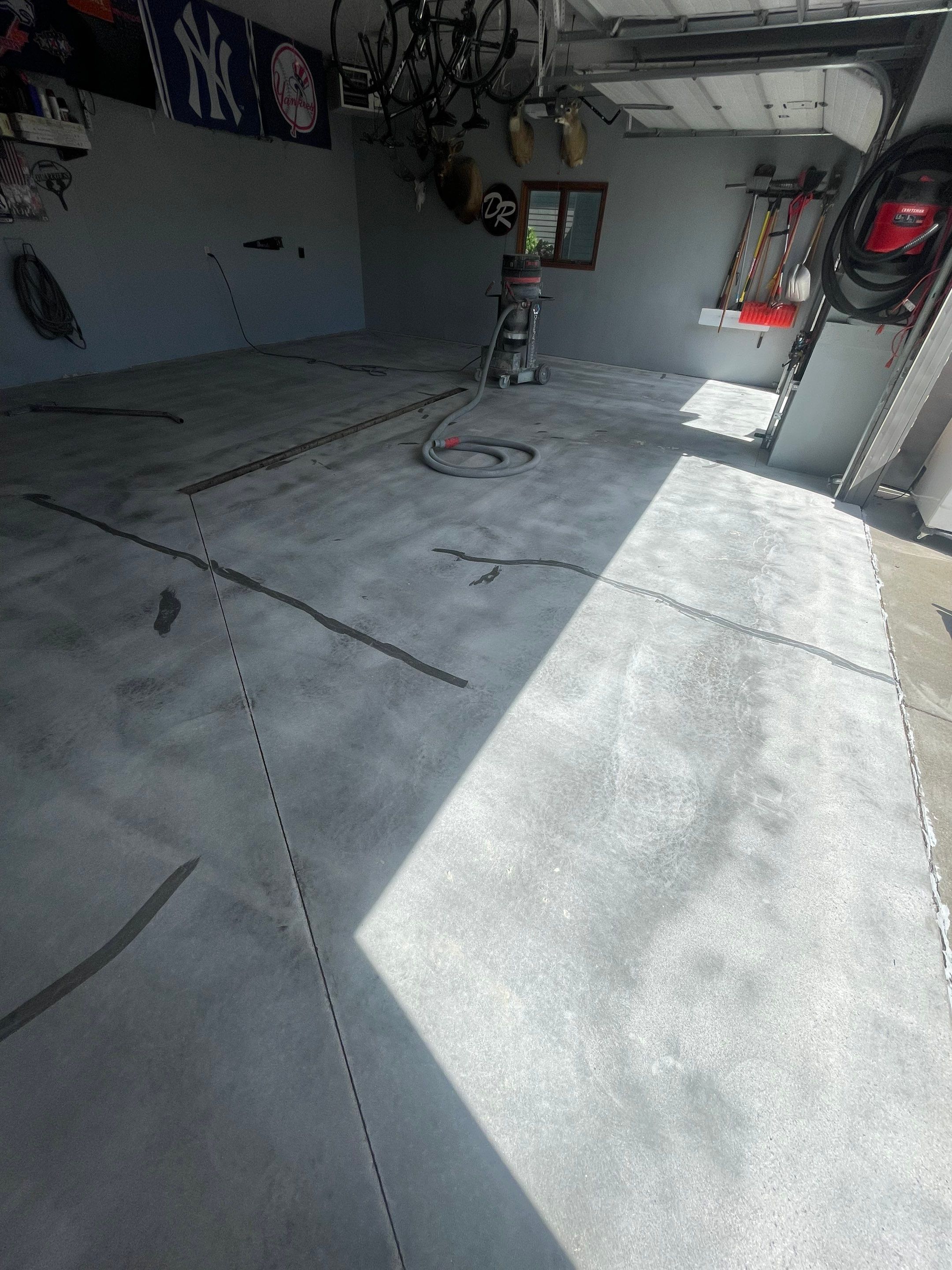 Full Garage Floor Epoxy Coating Installation in Dell Rapids by Select Painting, Coatings & Garage Cabinets