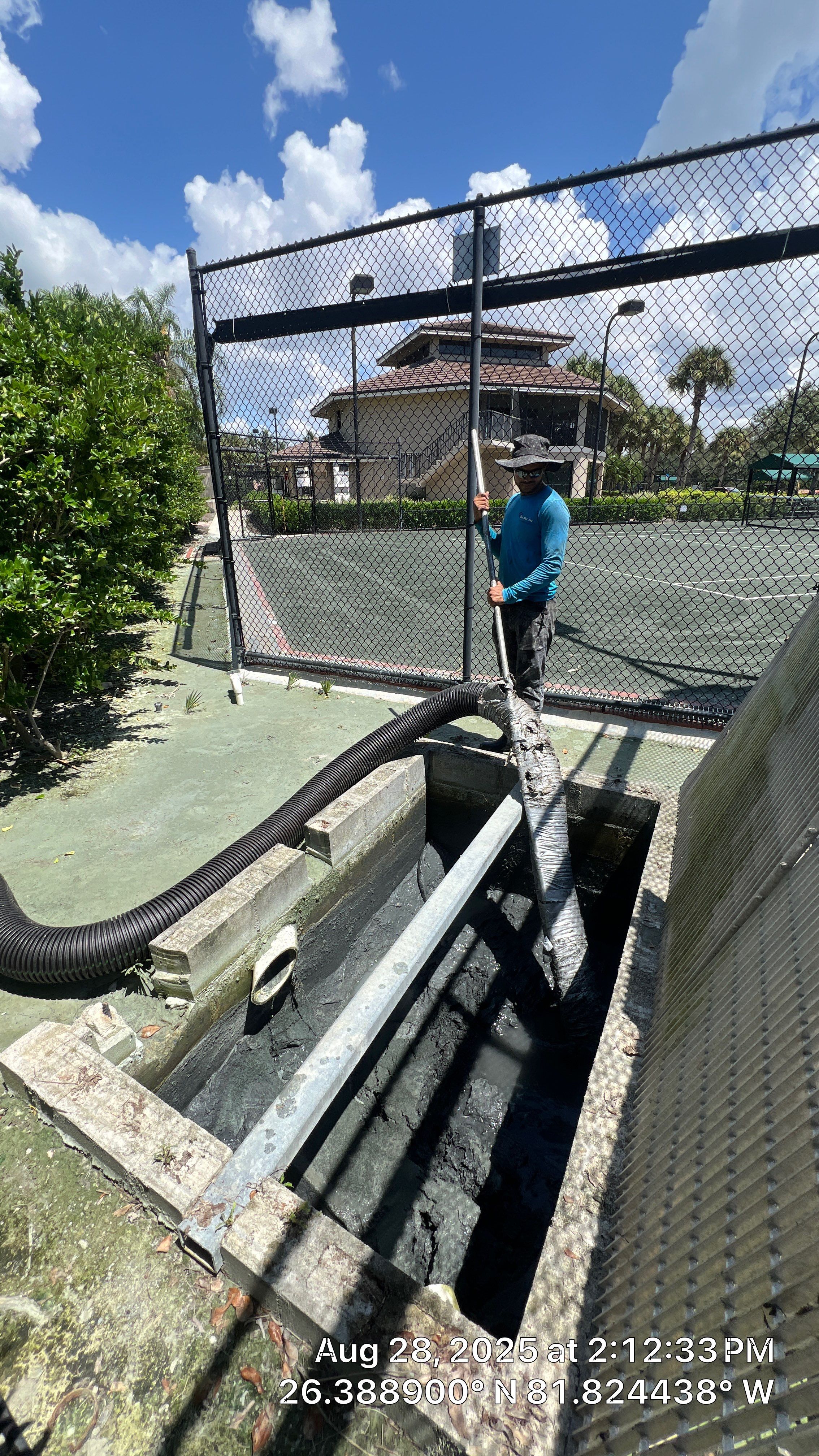 Pelican Landing Tennis Court Catch Basin Cleaning by Don Mar, Inc. Storm Water Solutions