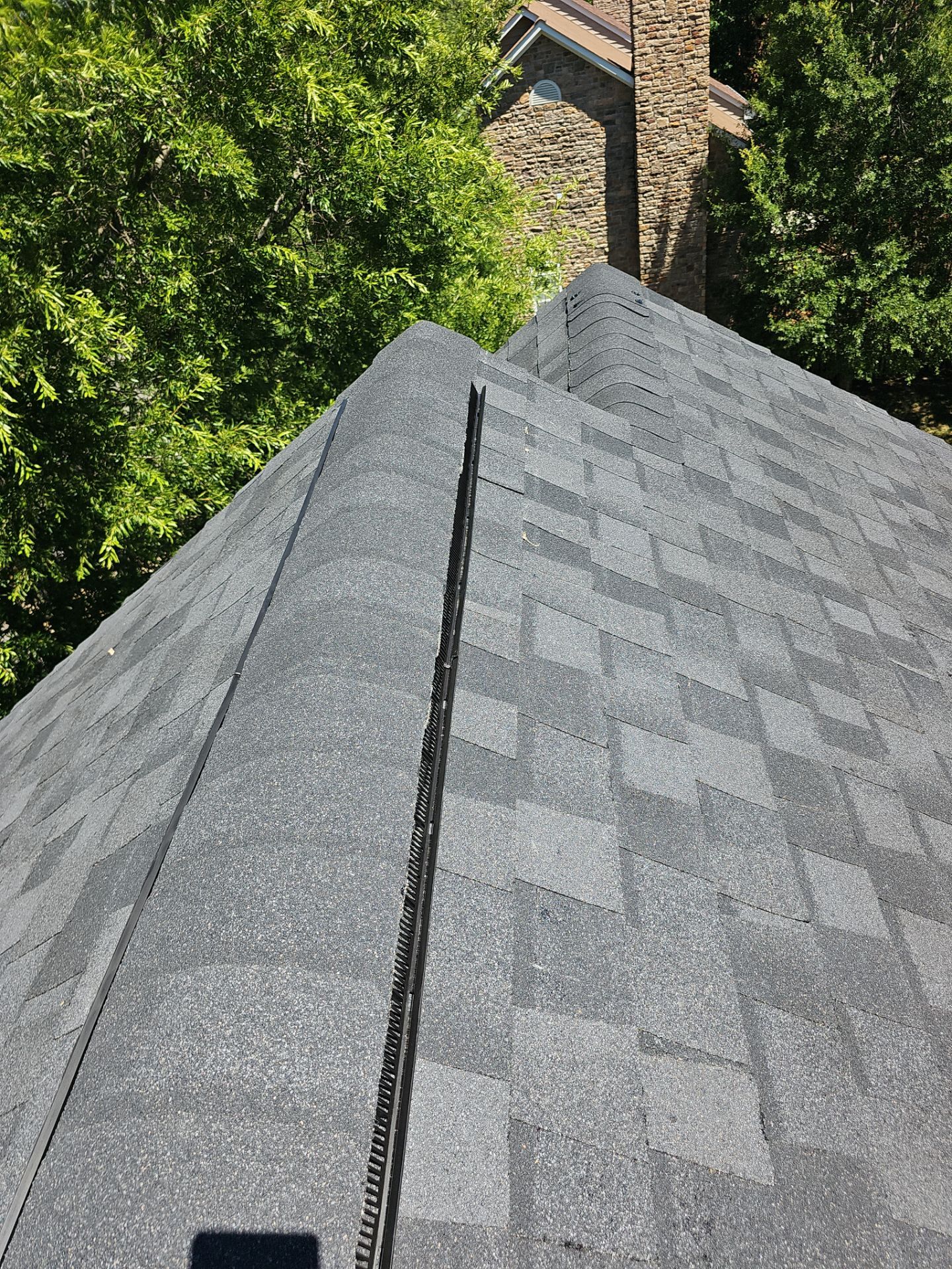 Roof Replacement - Moire Black by Winchester Roofing