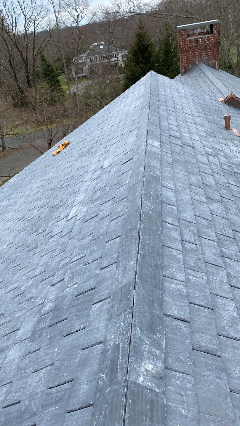 Residential Roofing Installation using Vermont Slate by A Plus Exterior