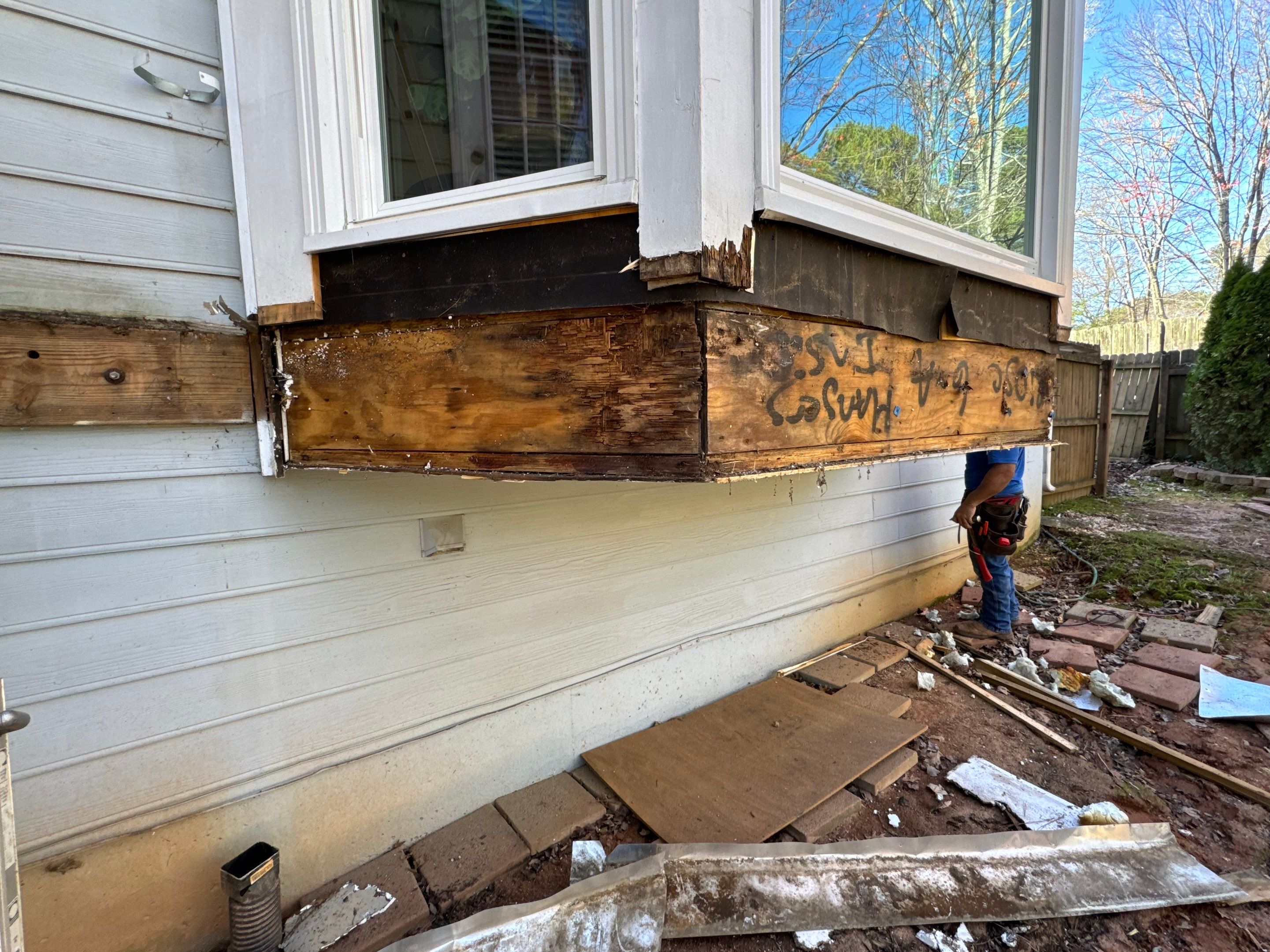 Elevated Deck Replacement with Black Metal Railings in Johns Creek by Swift Home Renovations