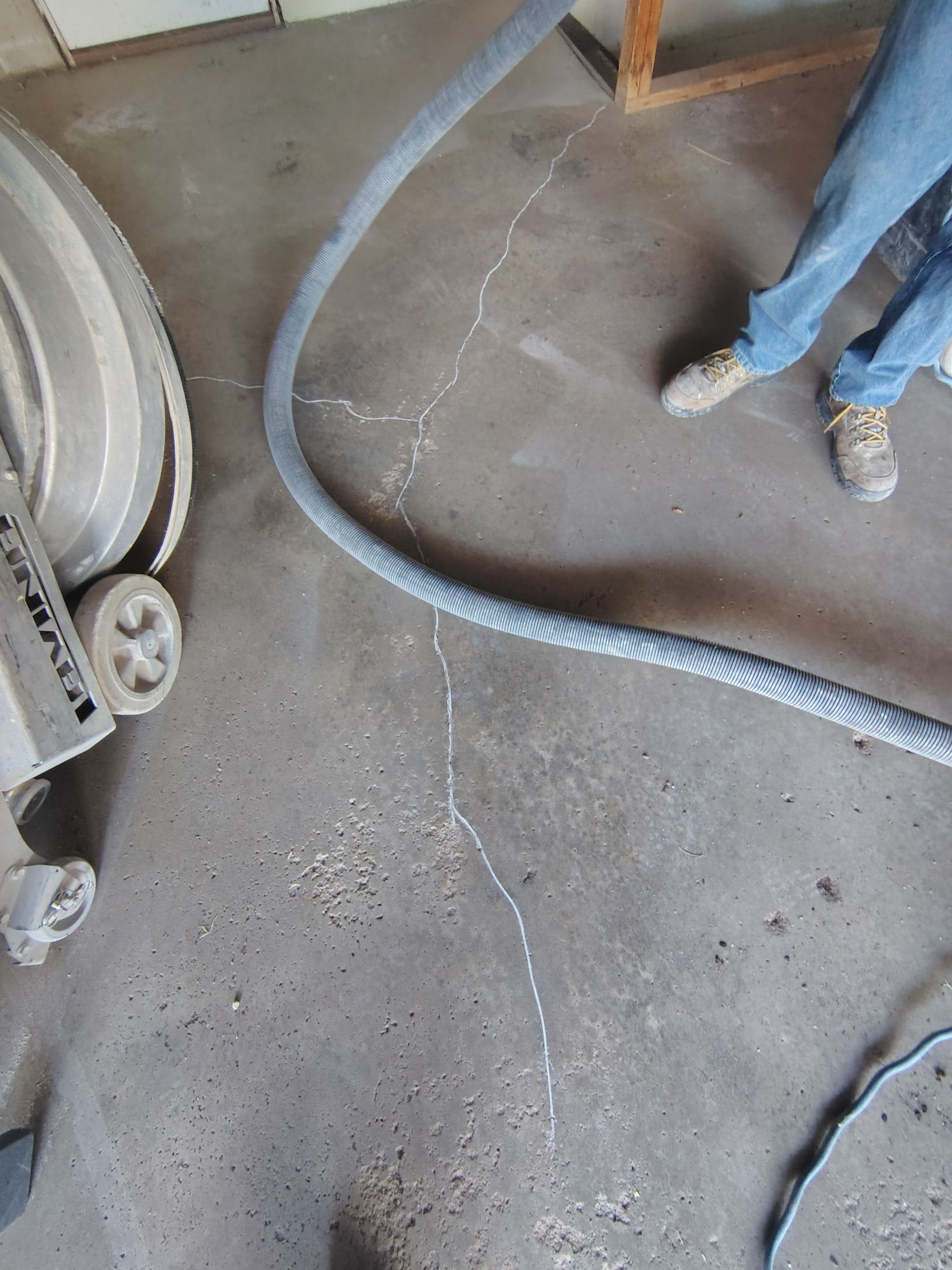 Sioux Falls Garage Epoxy Floor Installation and Concrete Crack Repair by Select Painting, Coatings & Garage Cabinets