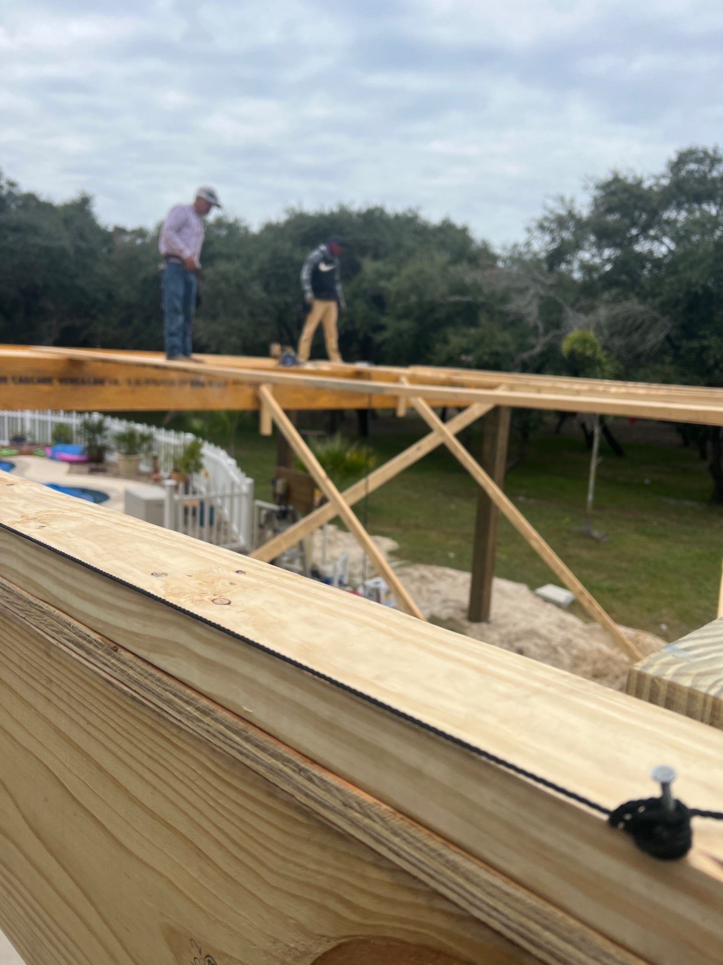 Poolside Pink Top by Bayfront Roofing and Construction