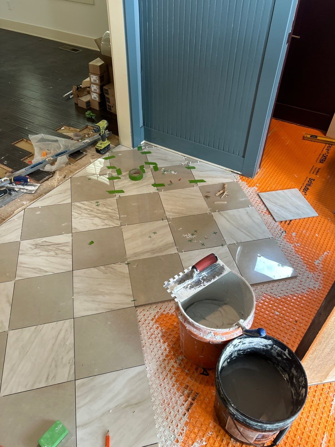White Oak Hardwood and Checkerboard Tile Installation by Footprints Floors of Nashville