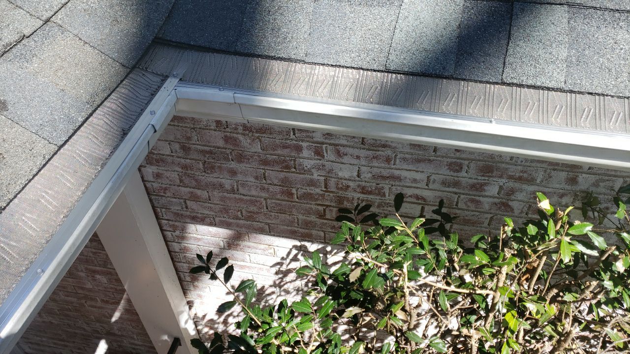 Gutter Cleaning using water by Power Wash Masters LLC