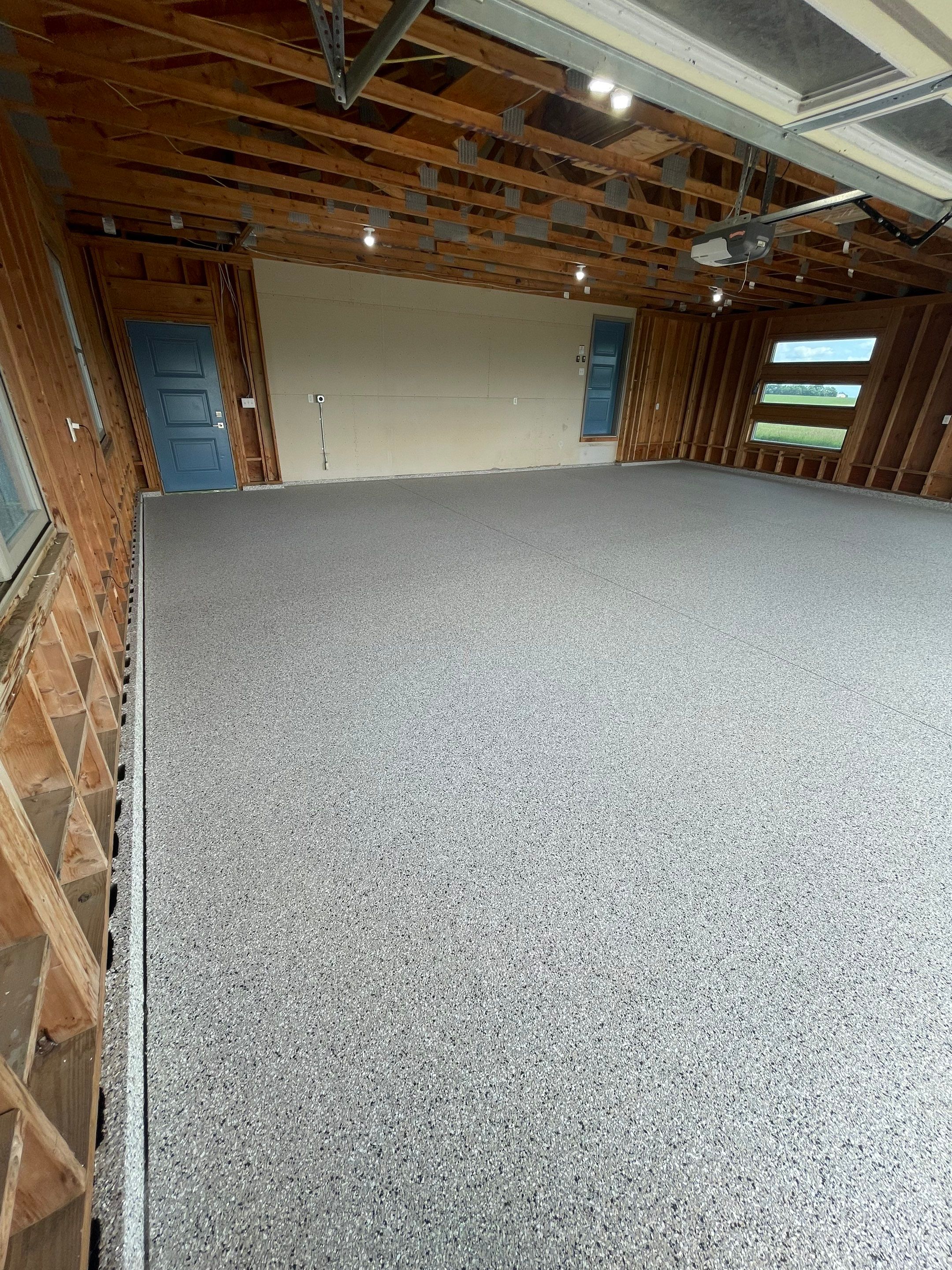 Cabin Fever Coating for Detached Garage in Dell Rapids by Select Painting, Coatings & Garage Cabinets