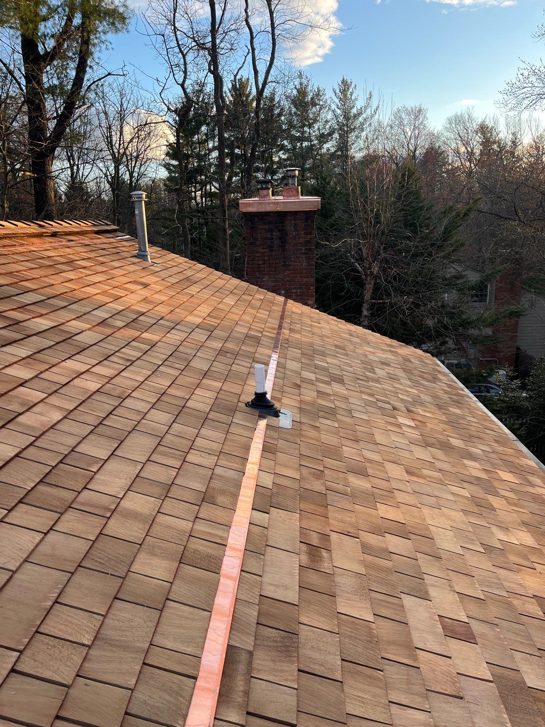 Roof Replacement using Cedar Shakes by CMNG LLC