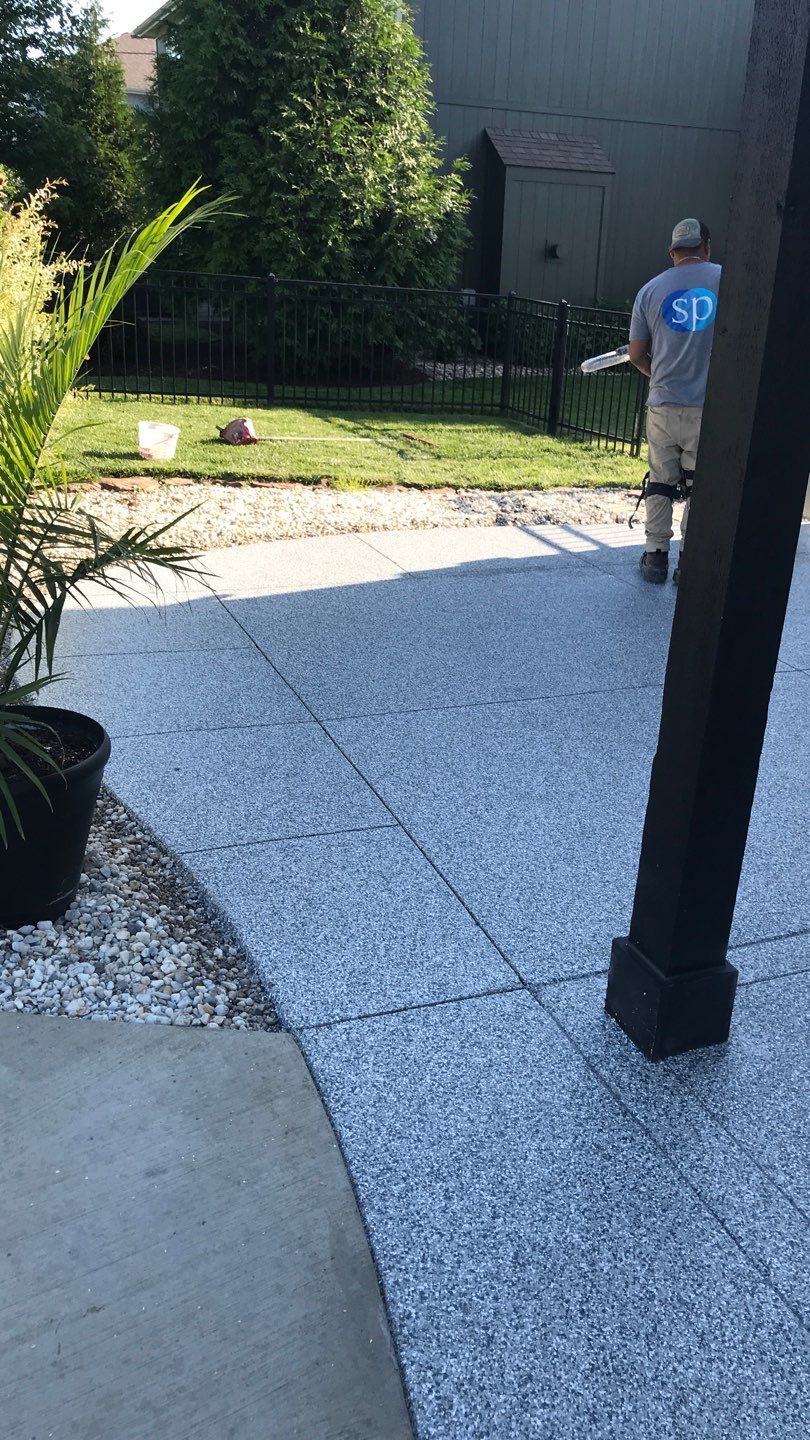 Patio using Slate Stone by Select Painting, Coatings & Garage Cabinets