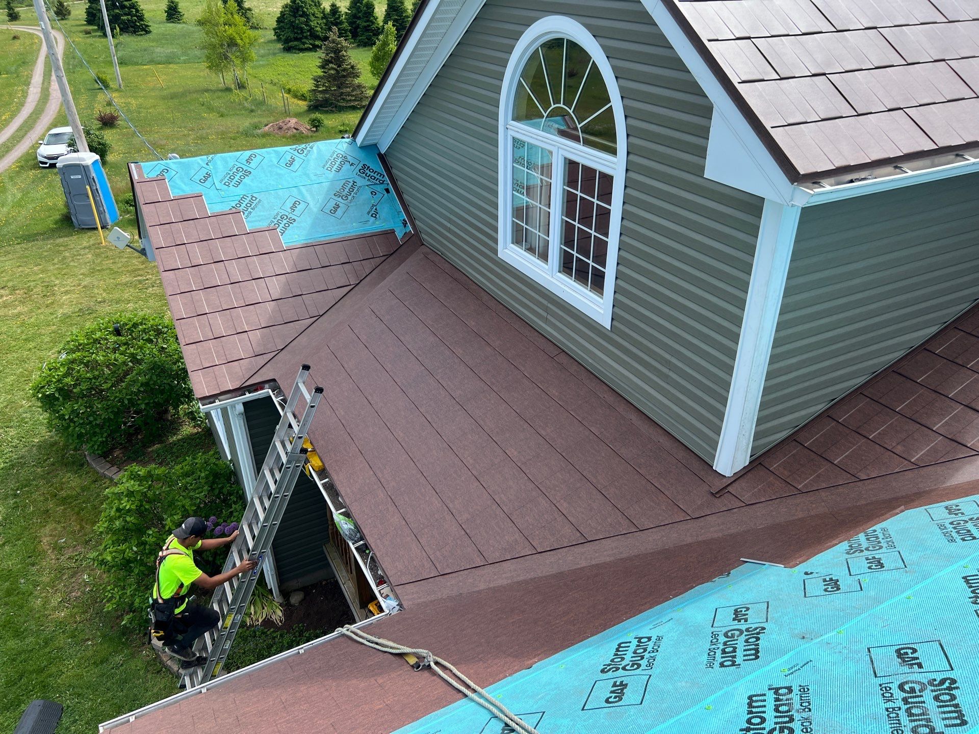 Residential Roofing Installation using Wakefield Bridge Steel Shingle by Ideal Steel by Artisan Roofing & Home Improvements Inc.