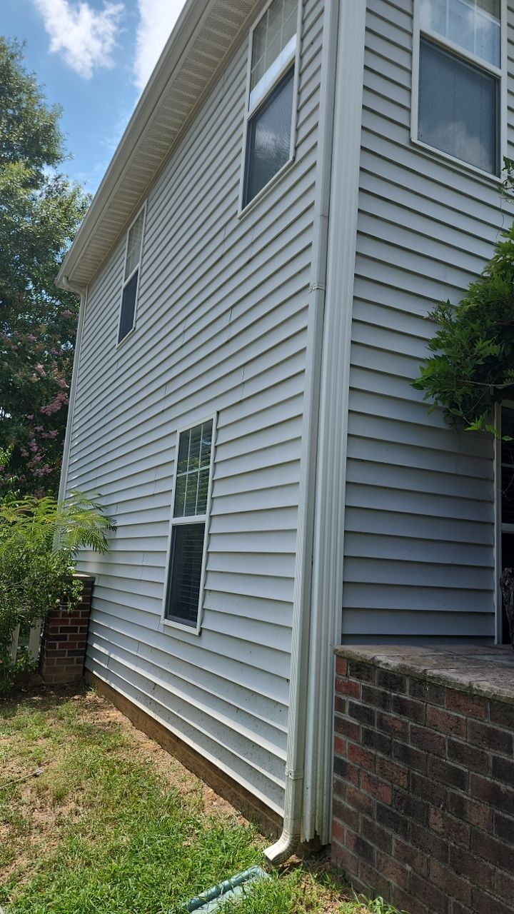 House Wash using cleaner by Power Wash Masters LLC