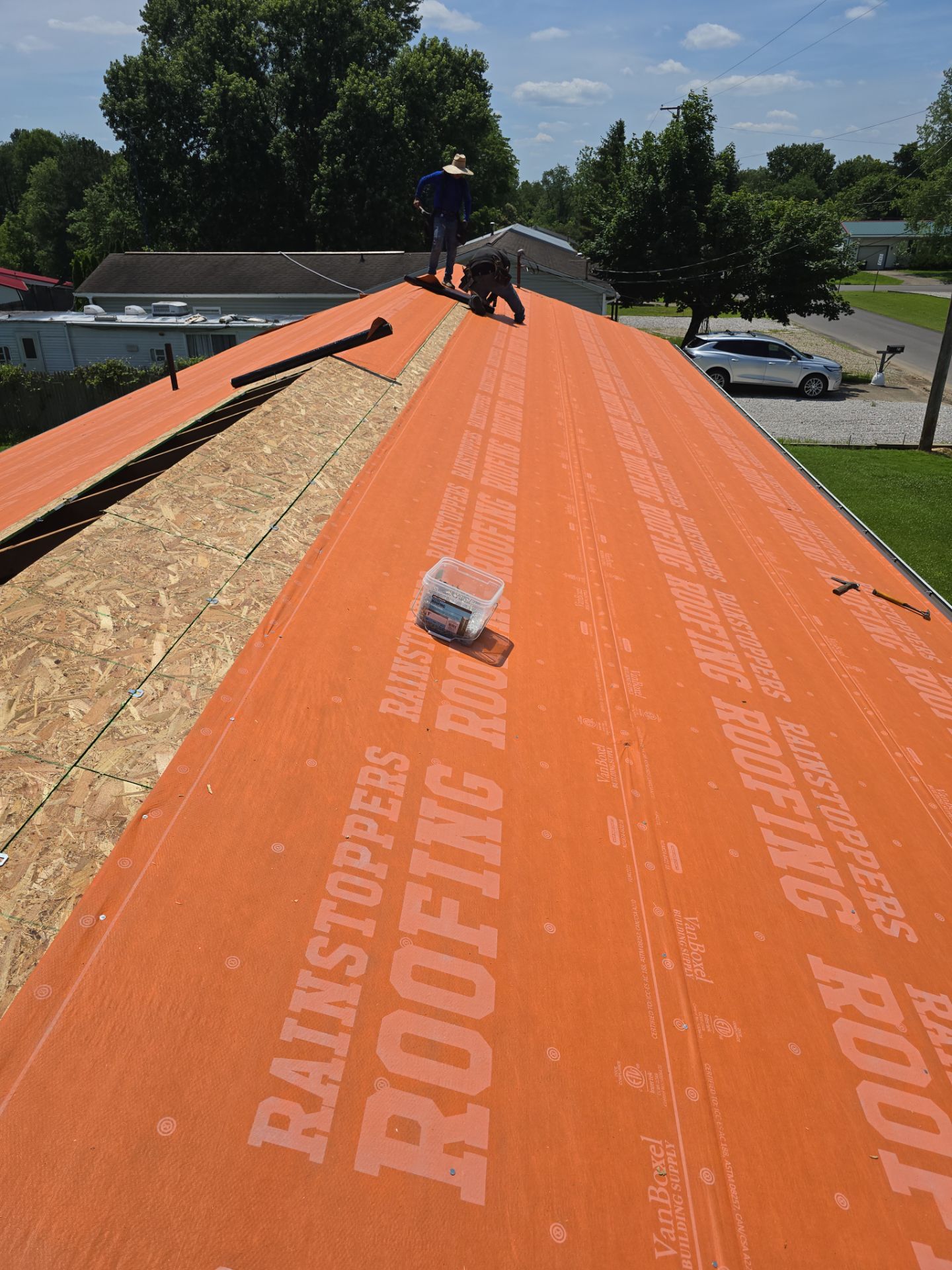 Residential Roofing Installation using Metal by Rainstoppers Roofing