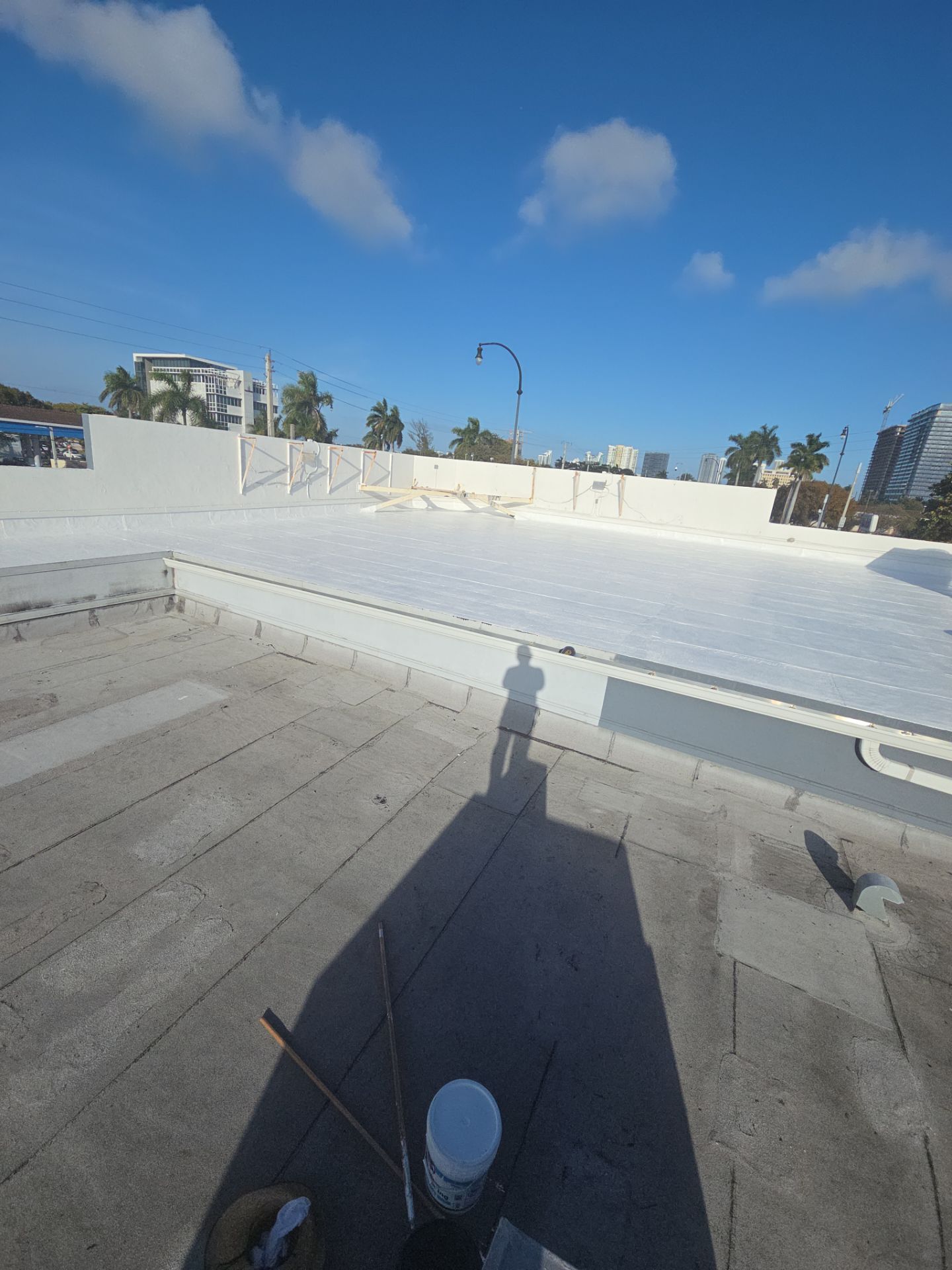 Commercial Flat Roof Restoration Using Silicone Coating in Hallandale Beach by Aastro Roofing