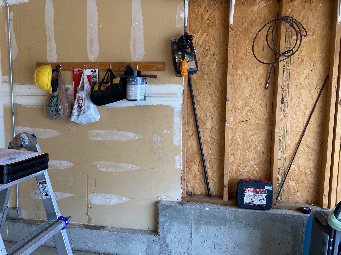 Water Damage in Garage by Accountable Home Services