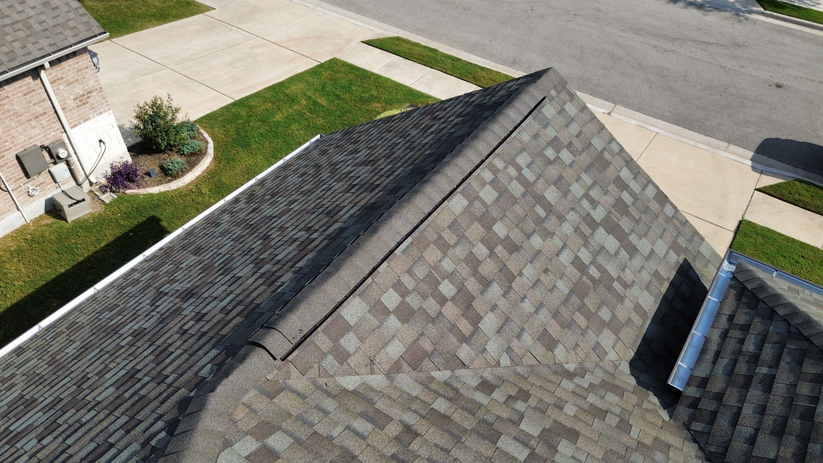 Full Roof Replacement with Solar Reinstall – Duration Driftwood | Round Rock, TX by Kstylez Roofing & Construction