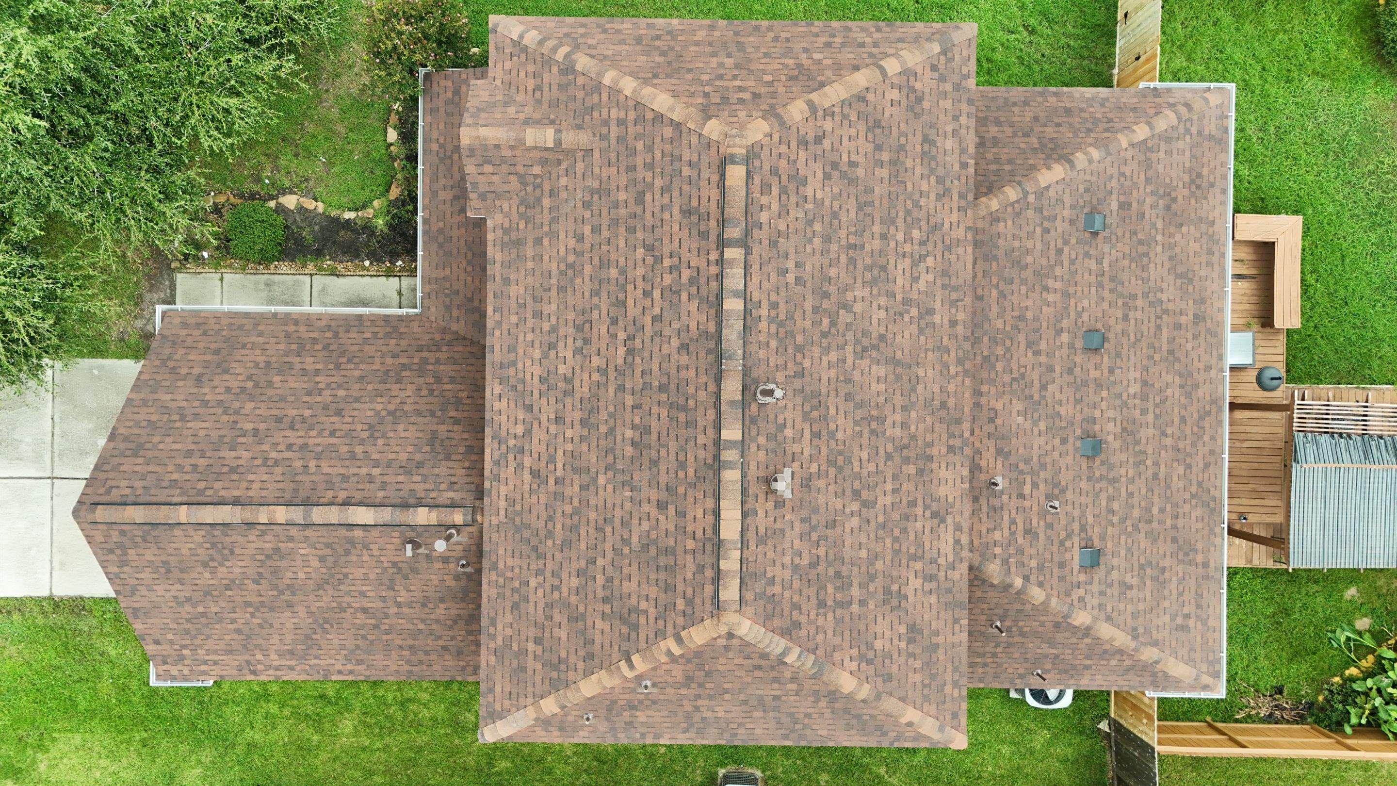 Full Roof Replacement in Warm Brown Tones — Spring, TX by PL Roofing & SB Roofing, LLC.
