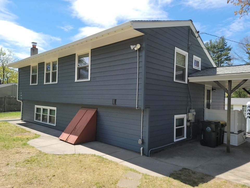Siding Installation using Everlast Composite Siding by UBrothers Construction