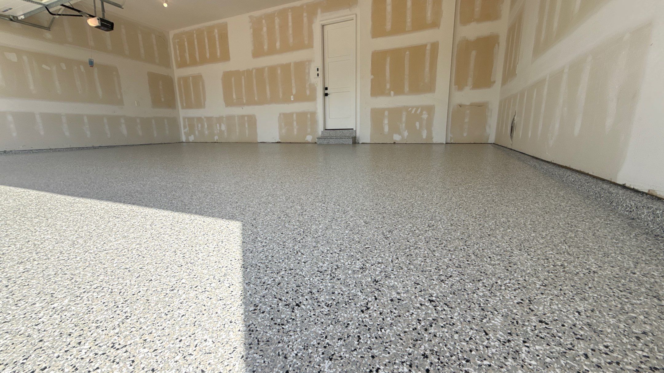 Comprehensive Garage Renovation Featuring Epoxy Flooring by Banner Garage
