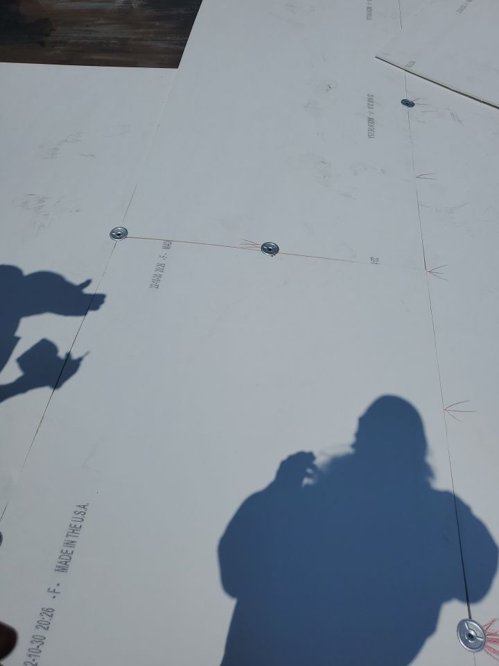 Residential Roofing Installation using 60 mil rubber roof  by Nitro Roofing and Construction