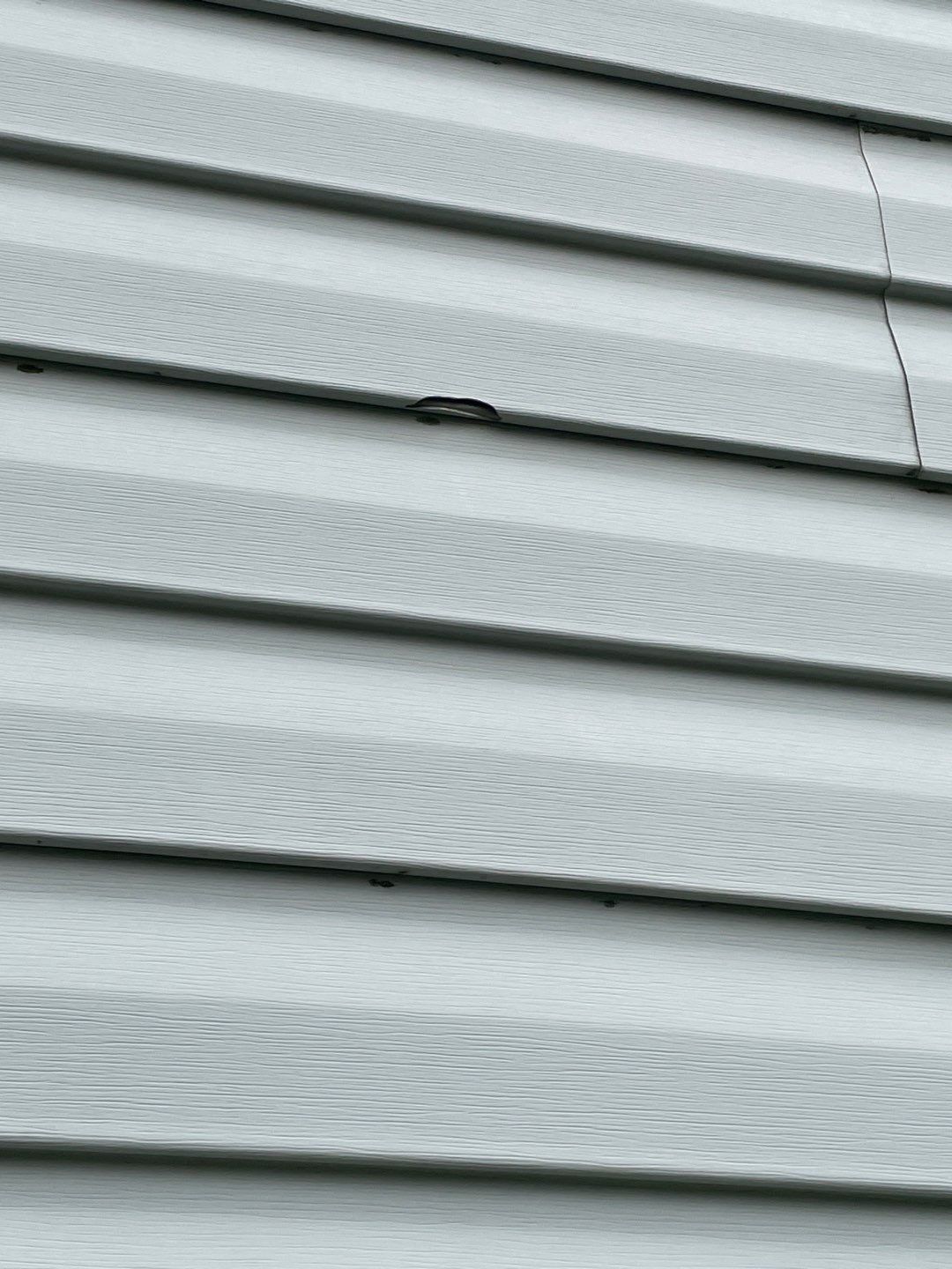Exterior Installation using Onyx Black Durations and White Siding by WIW Enterprises Inc