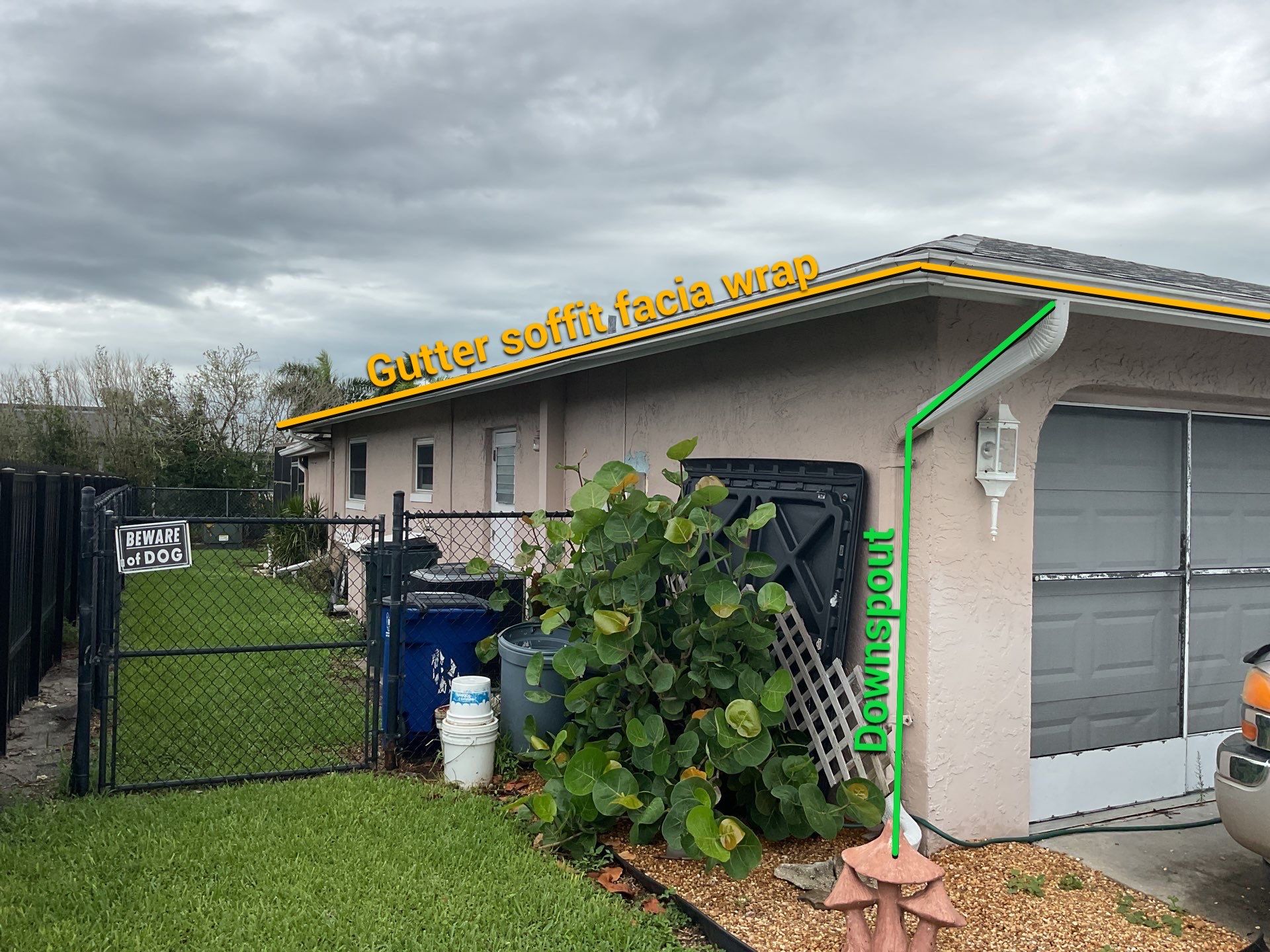 White Seamless Gutters and Splash Guards in Fort Myers FL by Gutter Professor by Gutter Professors