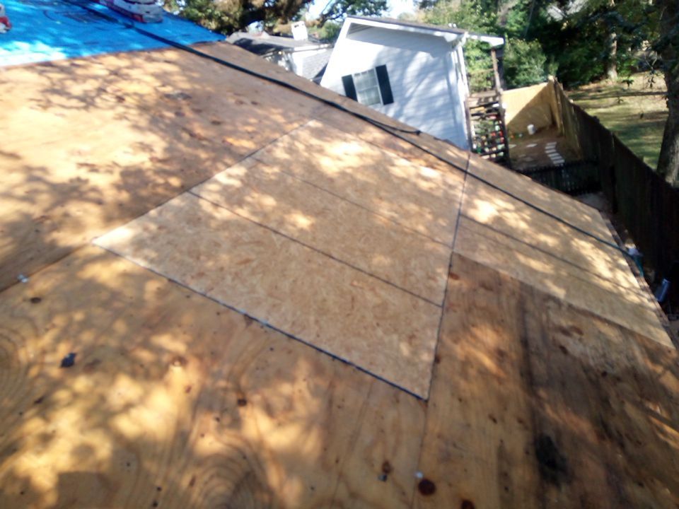 Residential Roofing Installation using Roof Replacement by American Roofing & Construction LLC