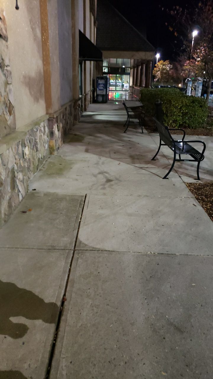 contrete cleaning using cleaner by Power Wash Masters LLC