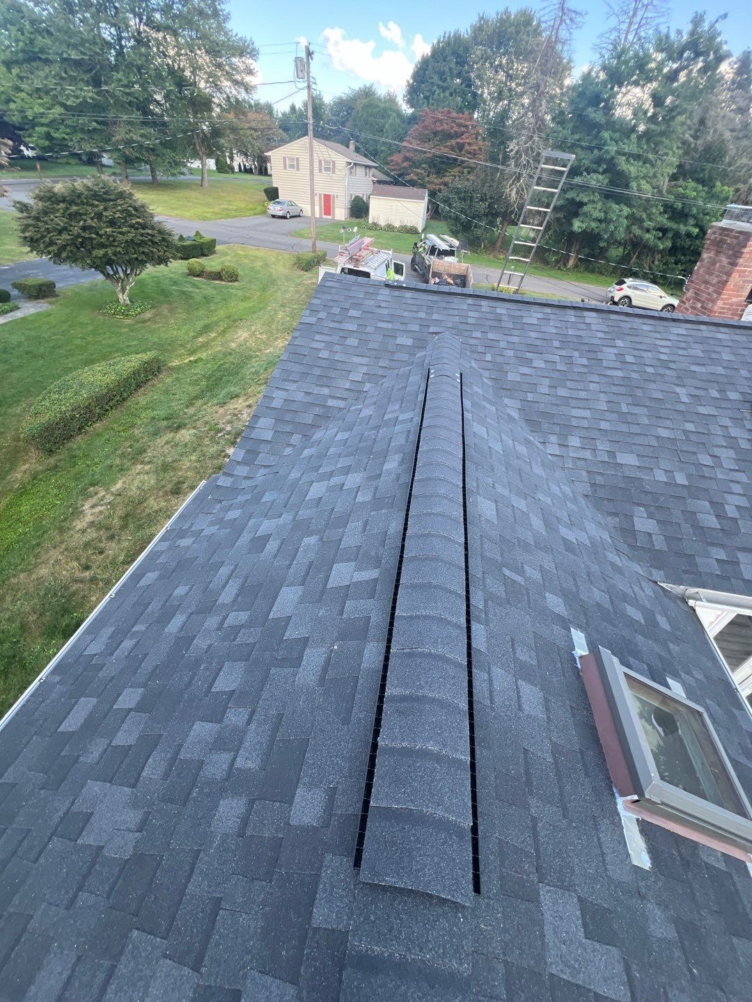 Onyx Black Shingles by Reimagine Roofing
