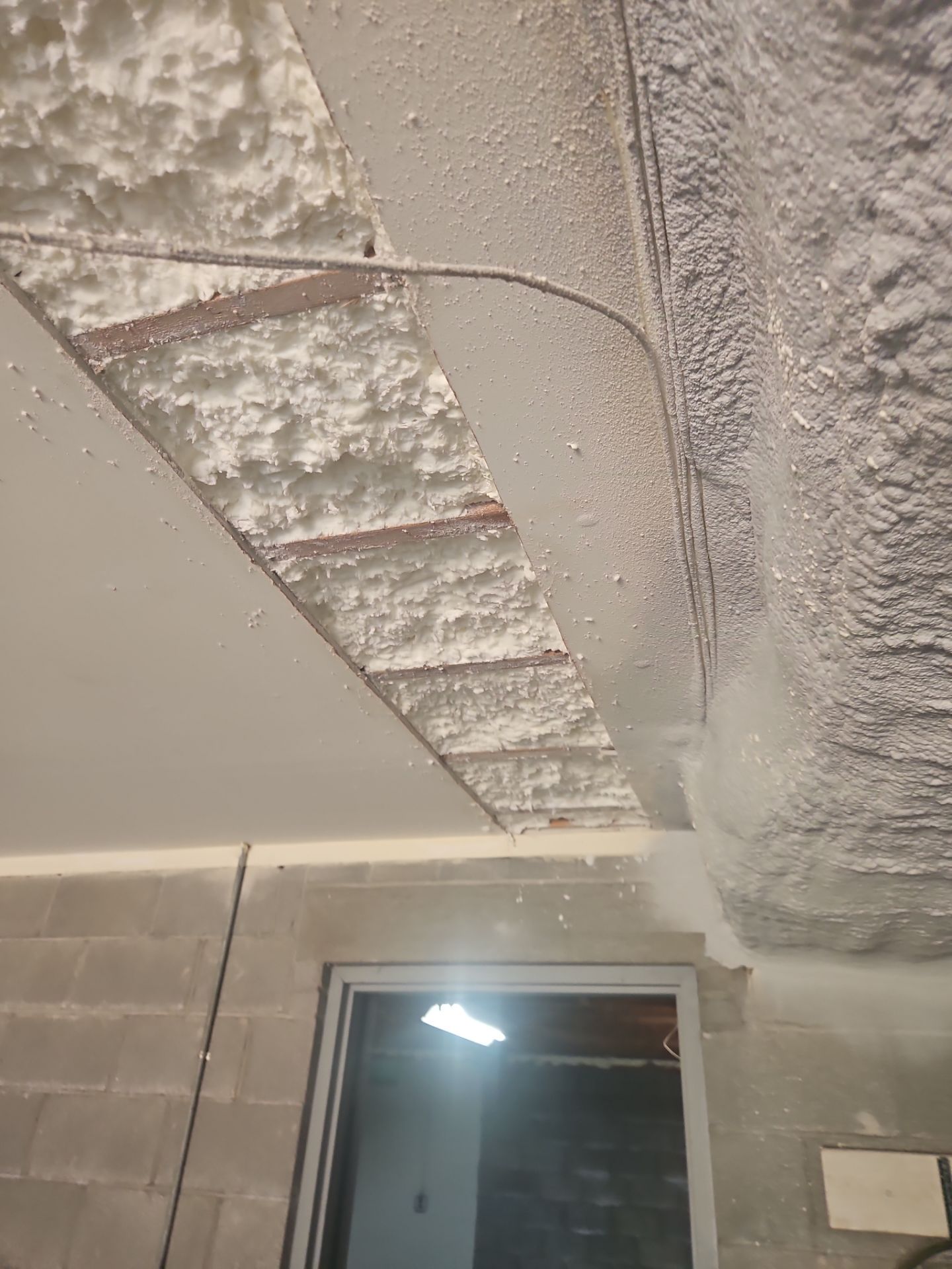 Retrofit using open cell spray foam by NYS Foam & Energy