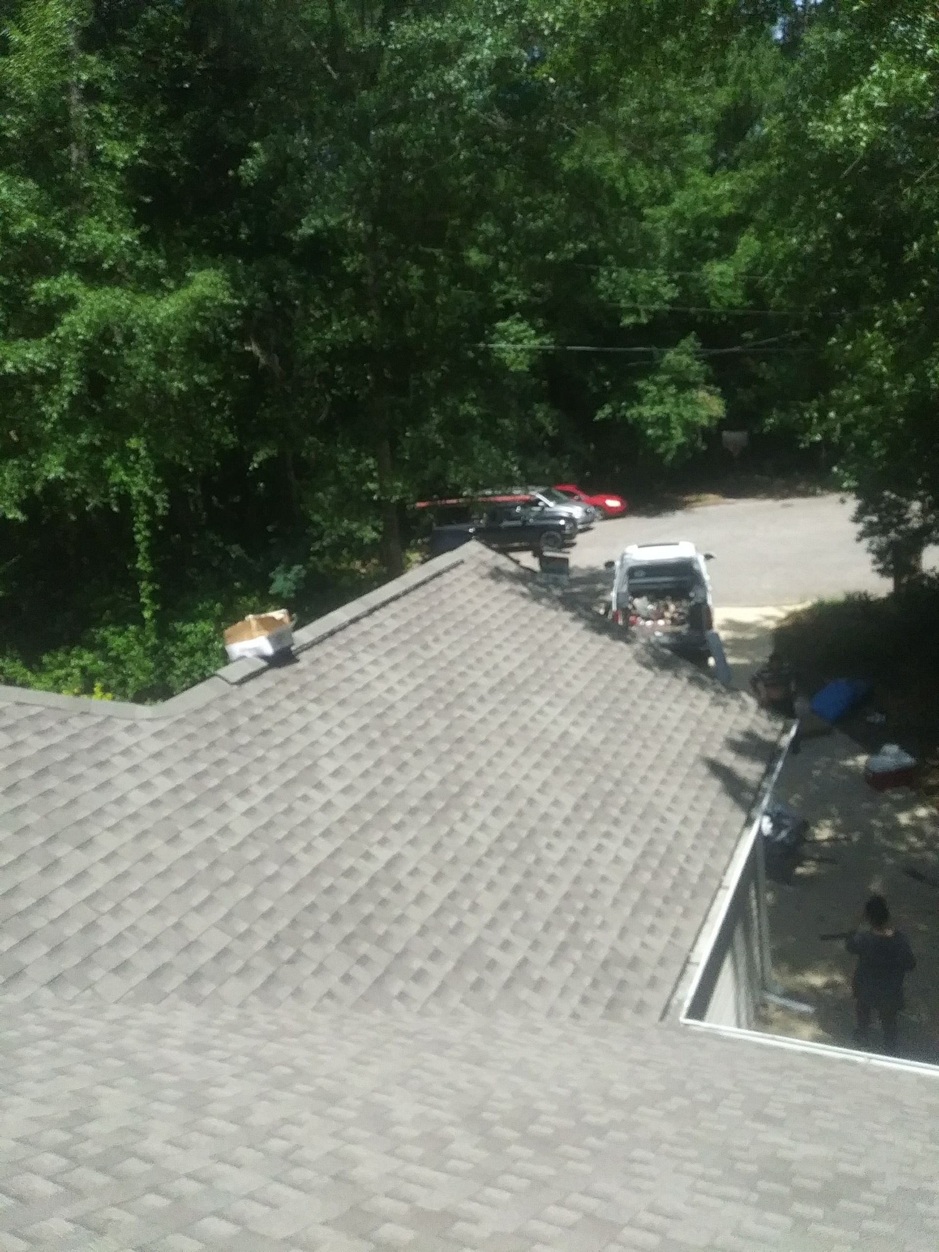 Residential Roofing Installation using Roof Replacement by American Roofing & Construction LLC