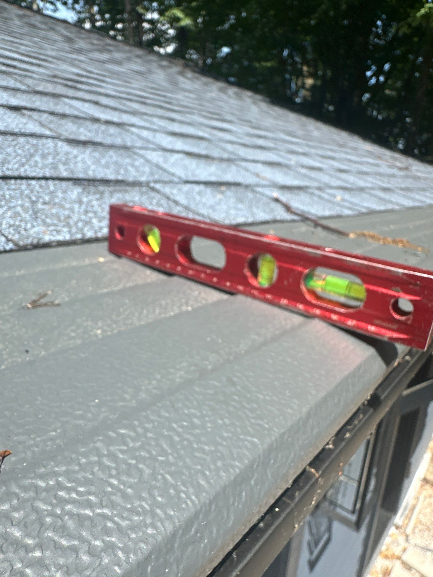 Gutter and Gutter Helmet Installation for Kewadin Residence by Rainbow Seamless Systems