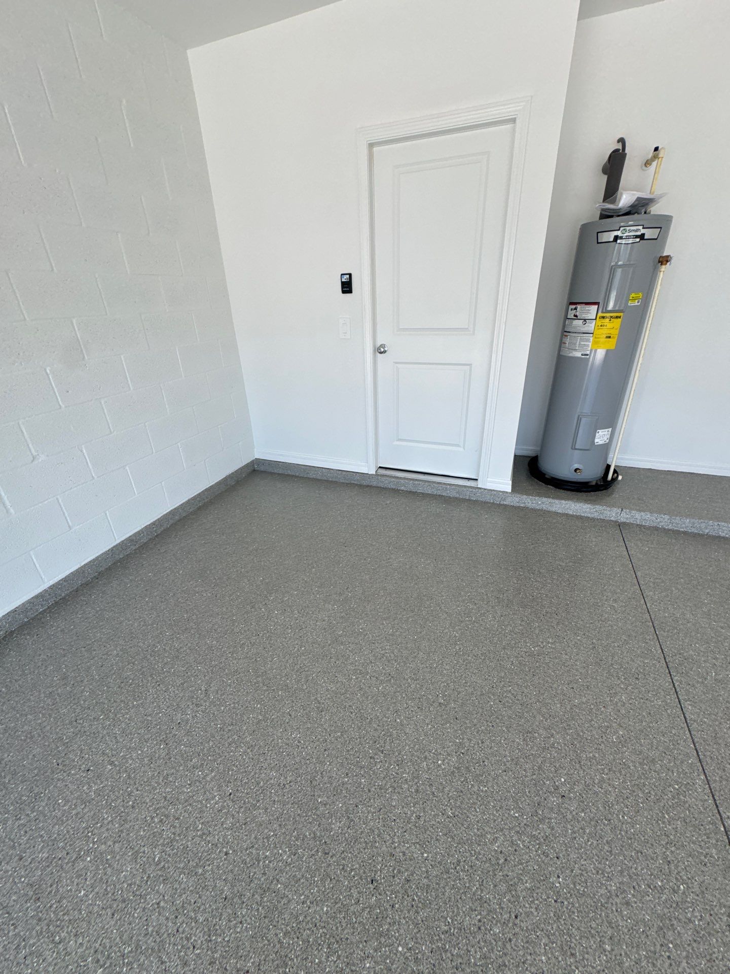 Artisanal Garage Finish: Multi-Toned 'Hybrid' Flake System by Performance Floors & Coating