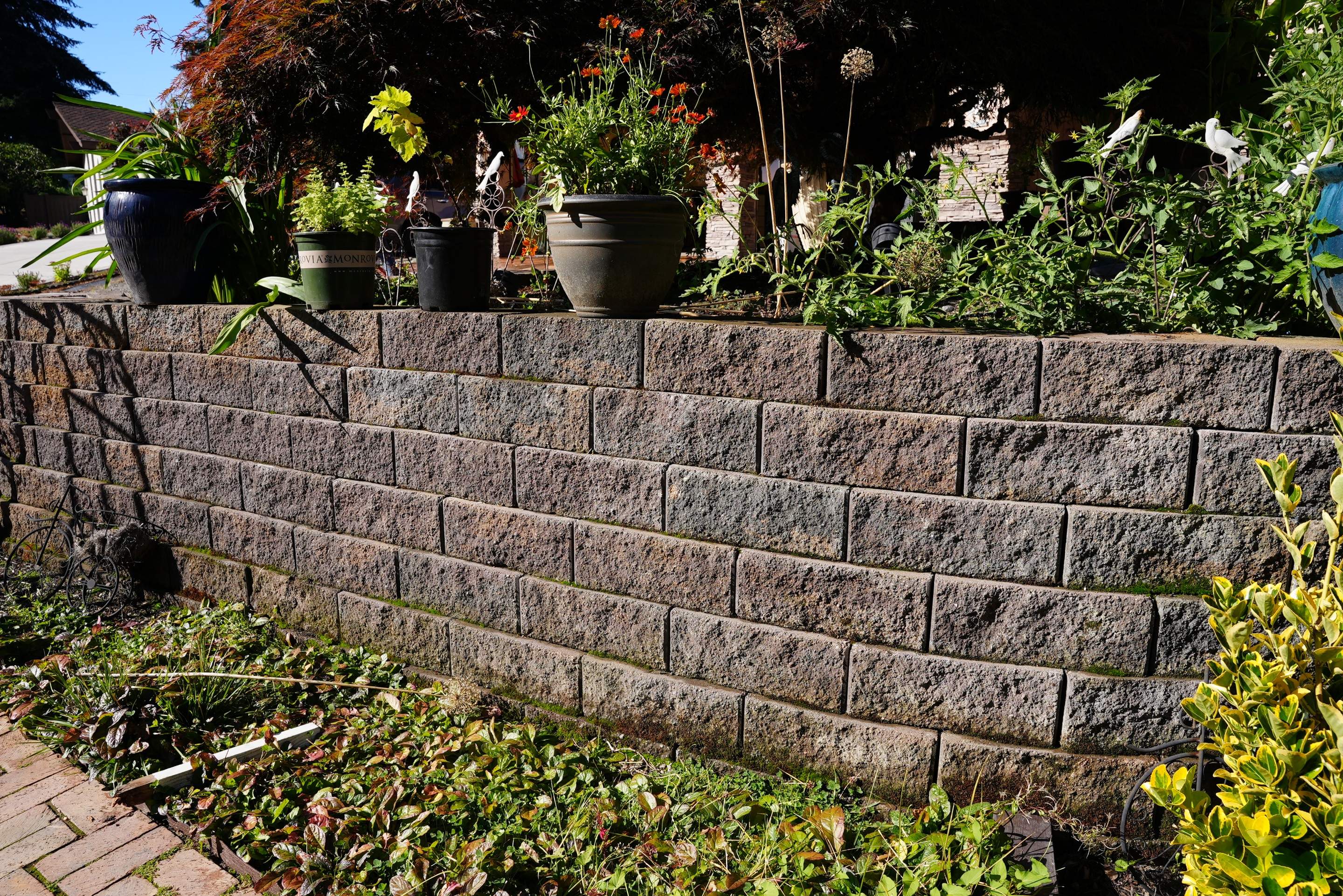 Mehta | Tiled Driveway with Sealer & Retaining Wall  by Jireh Asphalt & Concrete Inc 