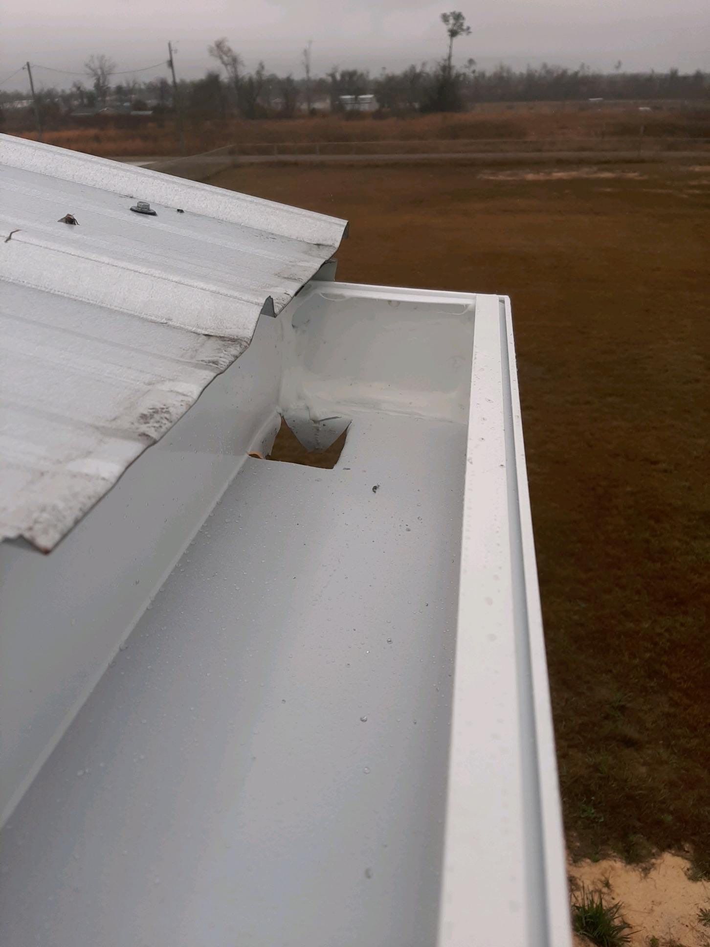 Gutter Installation Using White Seamless Gutters and Gutter Guards by Gutter Professors