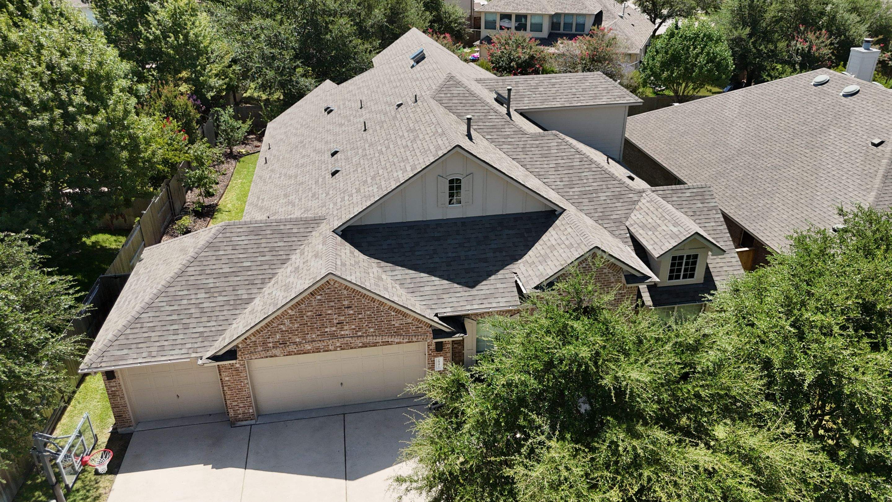 Residential Asphalt Shingle Roof Replacement and Solar Fan Installation by RoofsOnly.com