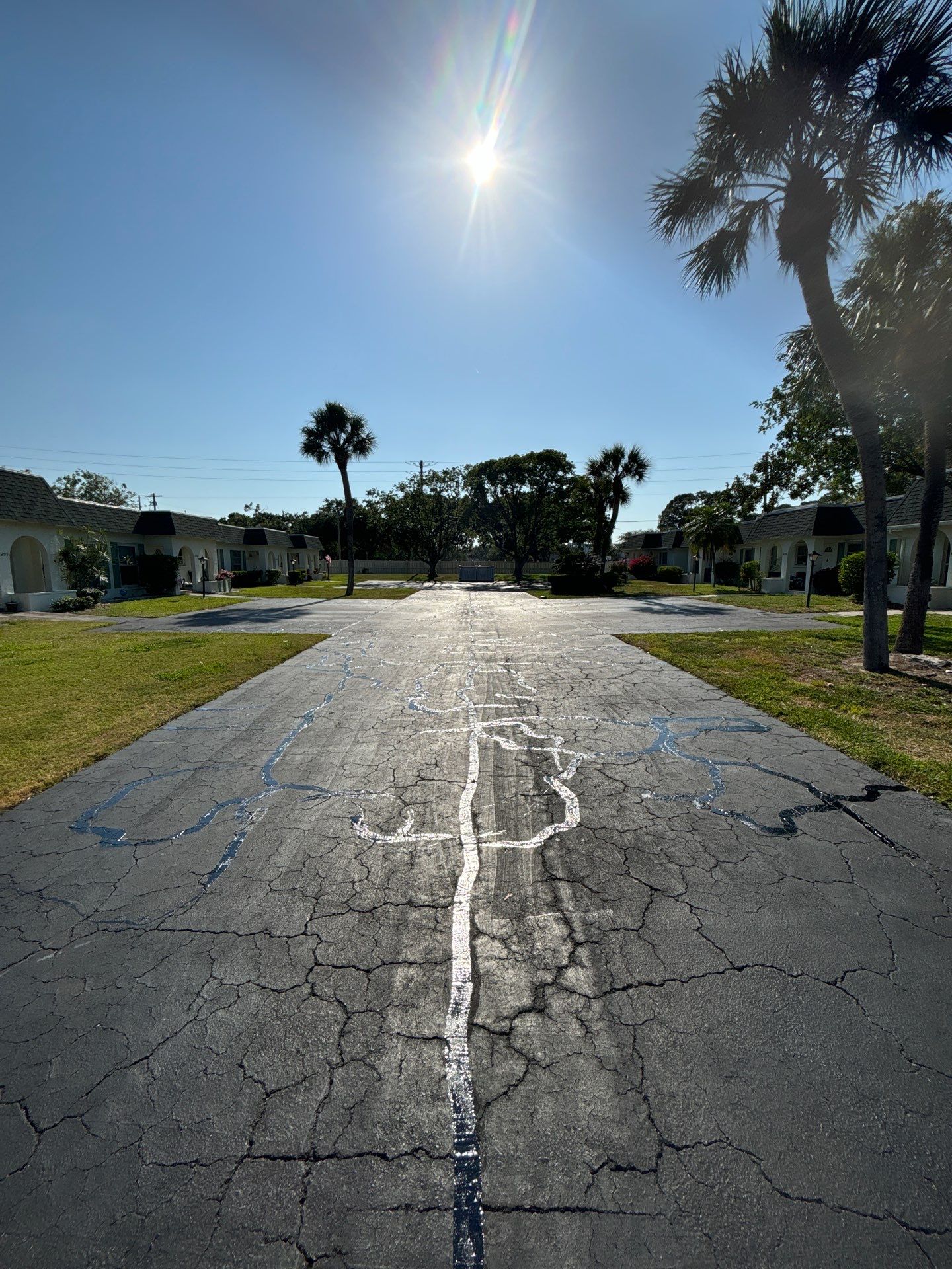 Sealcoating, Asphalt Repair, Crack Sealing, Line Striping at Cortez Villas Condo Association by Everline Coatings & Services - Southwest FL