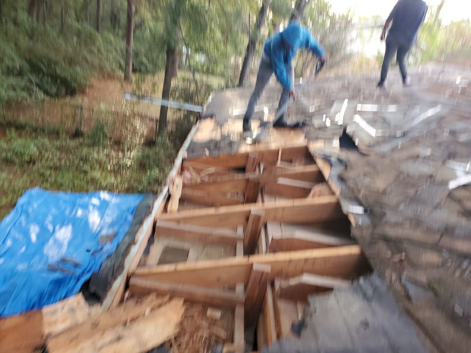 Residential Roofing Repair using Roof Replacement by American Roofing & Construction LLC