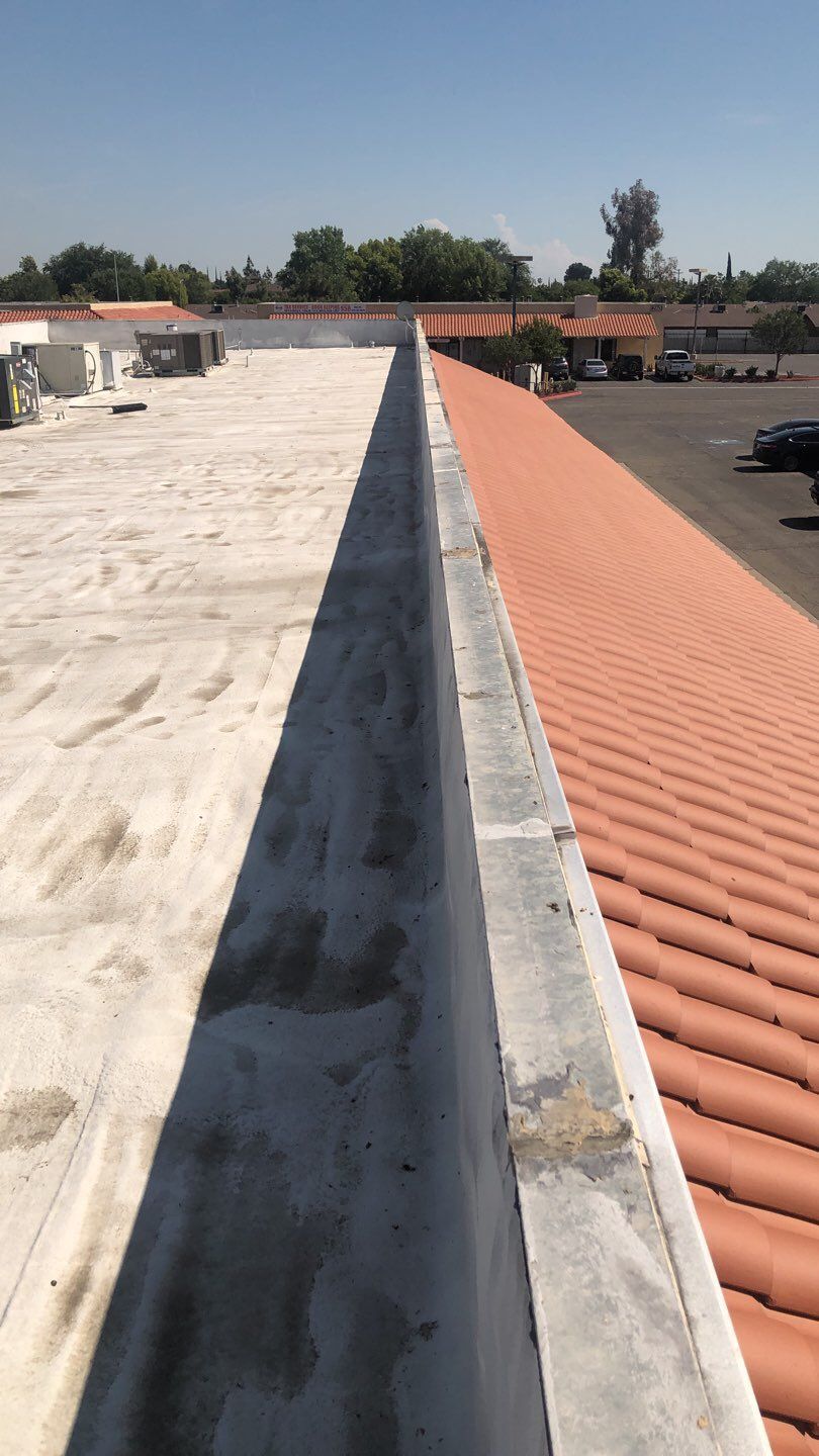 Reburbish existing spray foam job by Straight Edge Roofing Inc