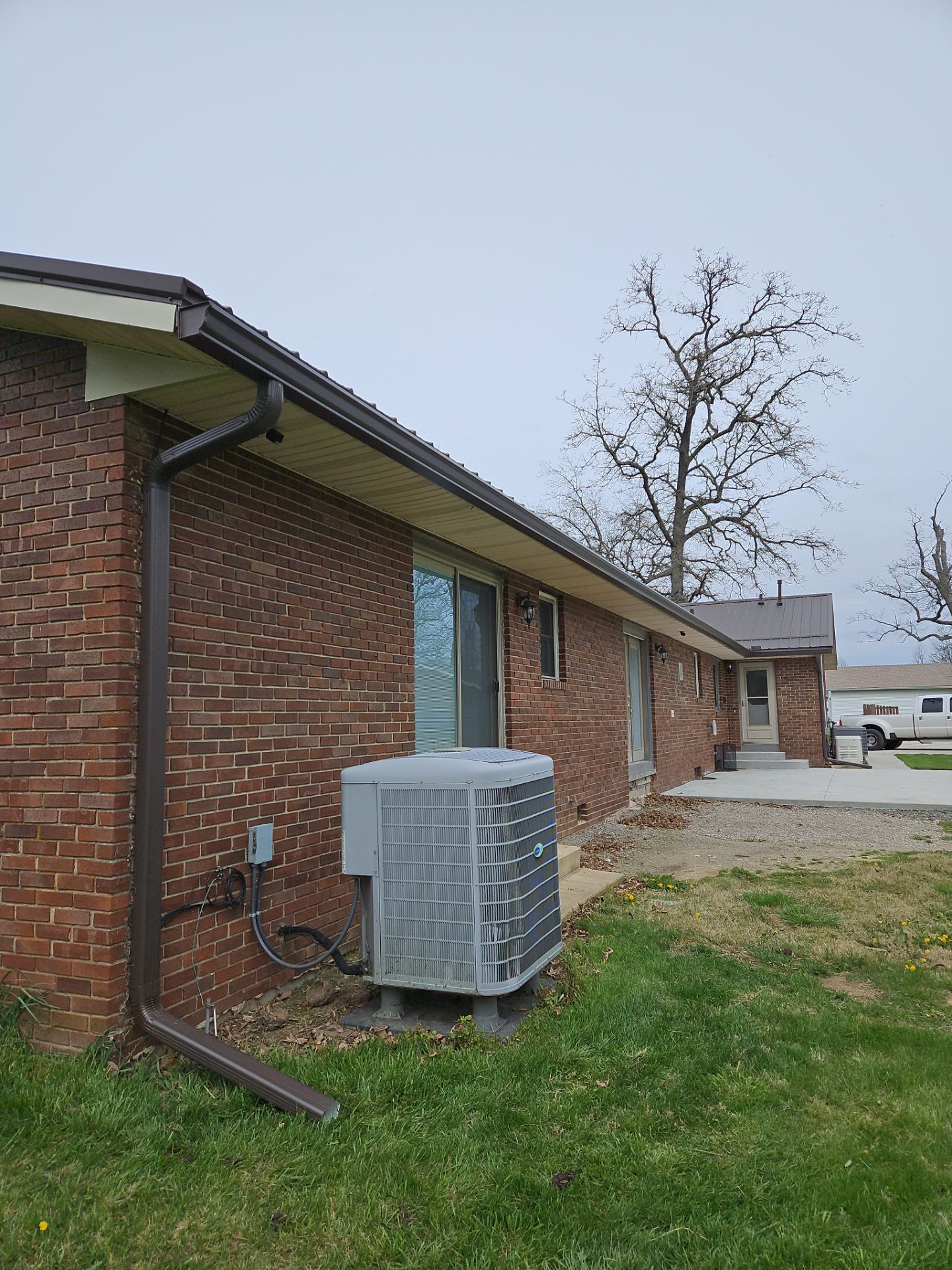 Residential Roofing Installation using Performance Panel Metal - Crinkle Bronze by RoofX 