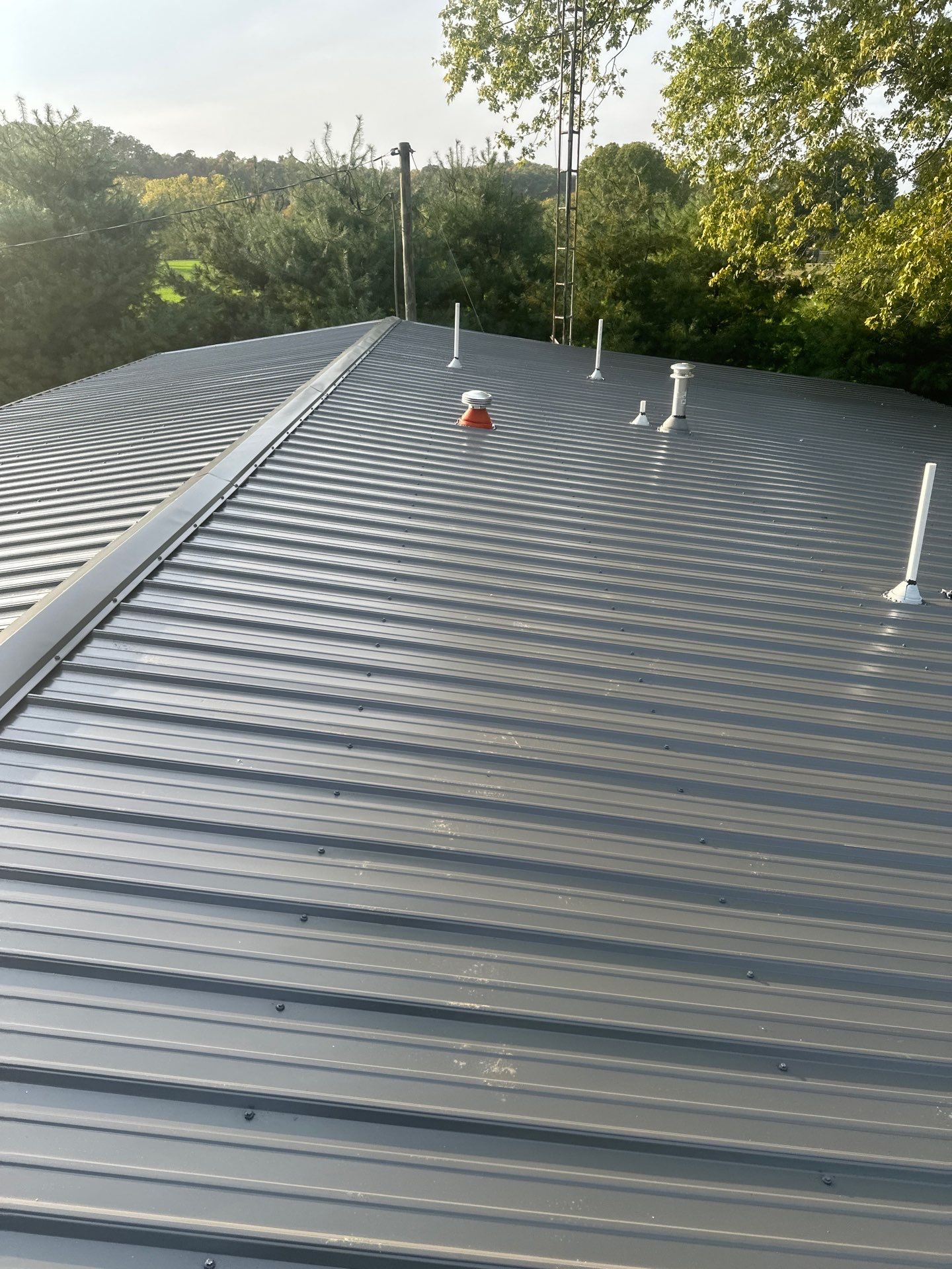Residential Roofing Installation using Metal by Rainstoppers Roofing